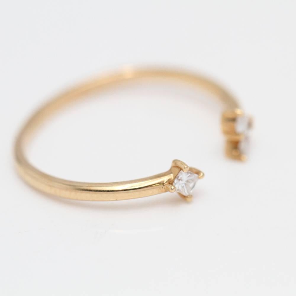 TOUS LIGHT gold ring for women : 3 pear, princess and marquise cut diamonds of 0.16 ct. : Size 15 (open) : 18 kt. pink gold : 1.4 grams. Measurements: 2.4 mm thick and 4.6 mm wide maximum. This ring is in excellent condition, with no visible wear