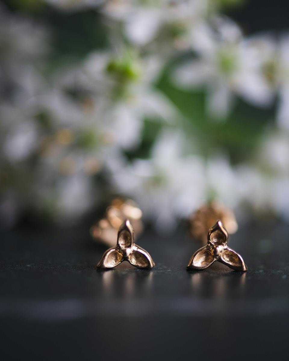 Classic 18K yellow gold trillium stud earrings. A must have for any occasion. Wear them year round. Wear them in your second hole. Jennifer hand carves these little 18K gold flower earrings. They have amazing detail and depth for such a small