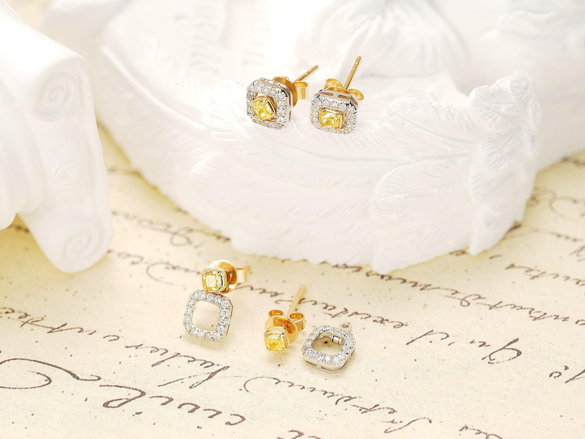 Moderne Clous d'oreilles coussin à trois anneaux en or 18 carats avec diamants jaunes naturels en vente