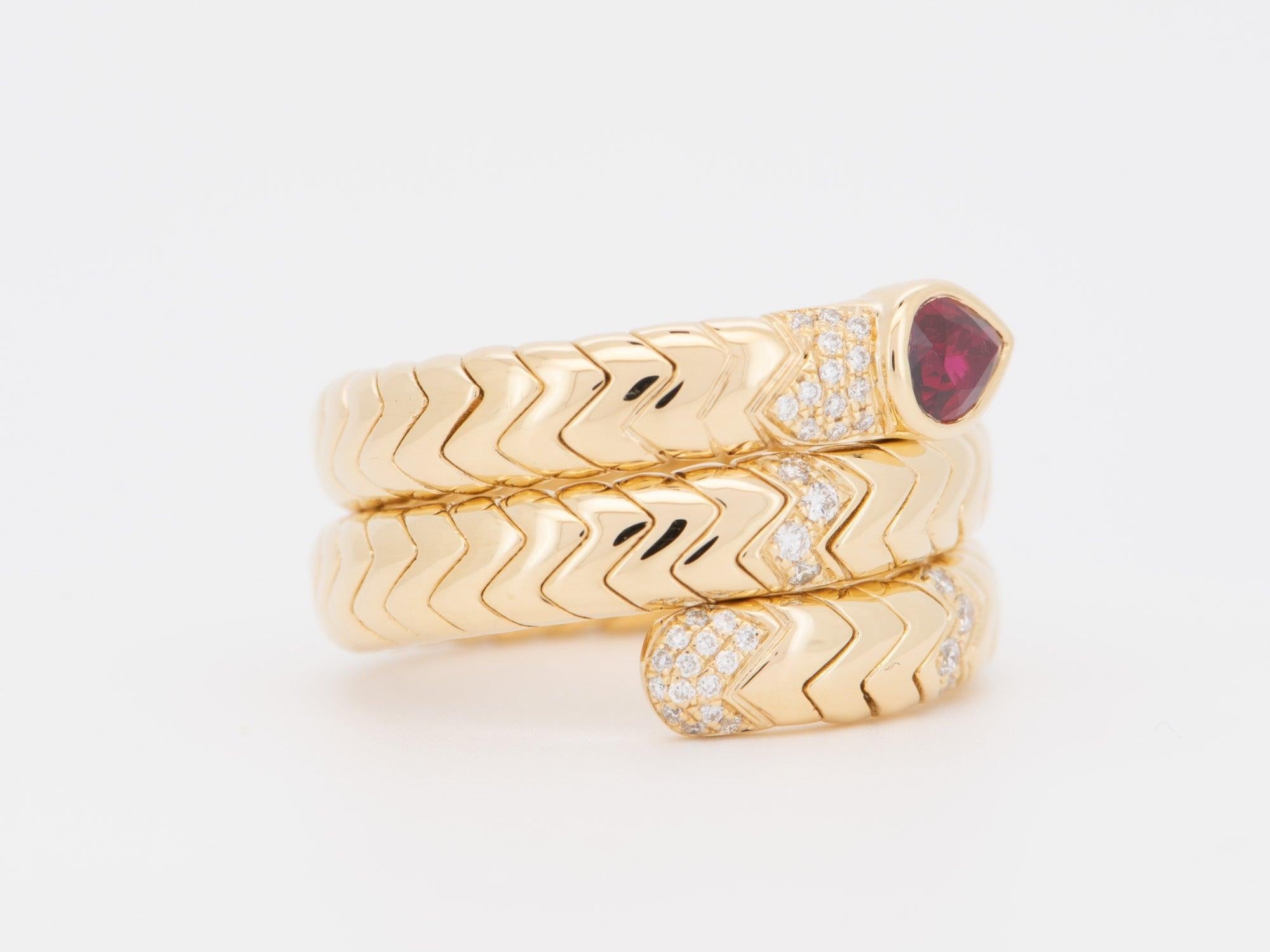♥ 18K Gold Tubogas Snake Coil Ring with Ruby Head and Diamond Accent 13g Designer Jewelry Flexible Serpente Serpent Cool Wide Band R6711
♥ Gorgeous color!

♥ The item measures 14.3 mm in length, 22.5 mm in width, and stands 3.5 mm from the finger
♥