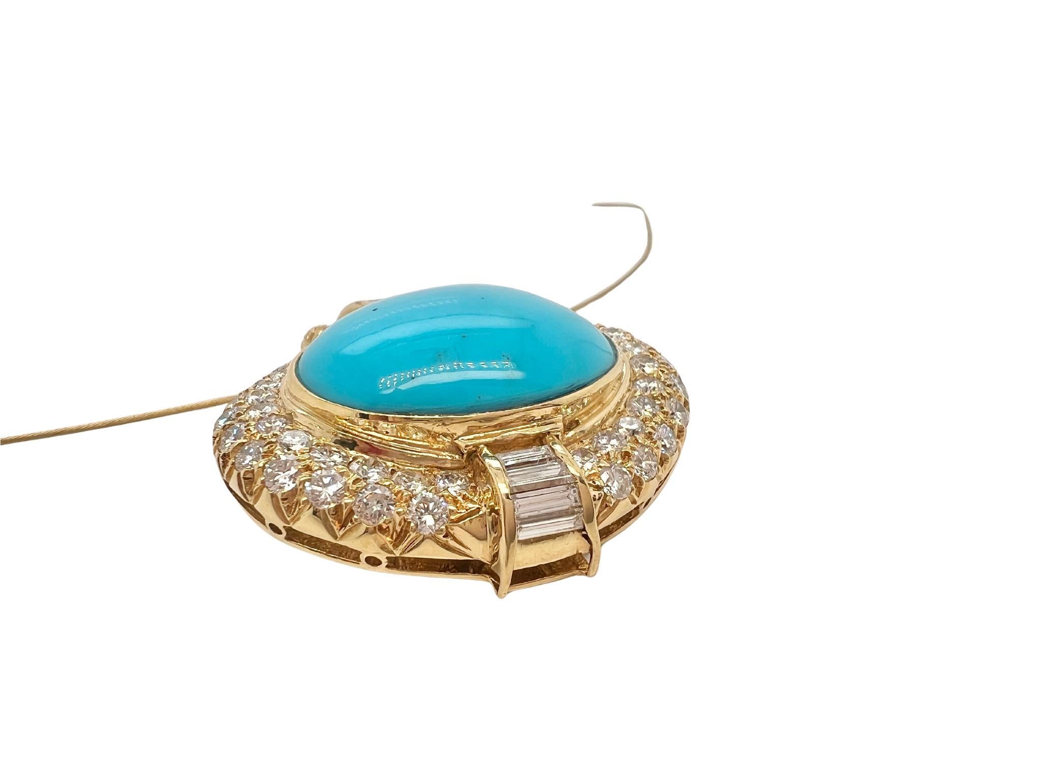 Collana con turchese e diamanti in oro 18k

Dettagli:
Con turchese ovale incastonato e diamanti rotondi e a baguette per un peso di circa 4,70 carati, in oro 18k, con catena a cavo in oro 14k, circonferenza interna di 16 pollici.
Il turchese misura