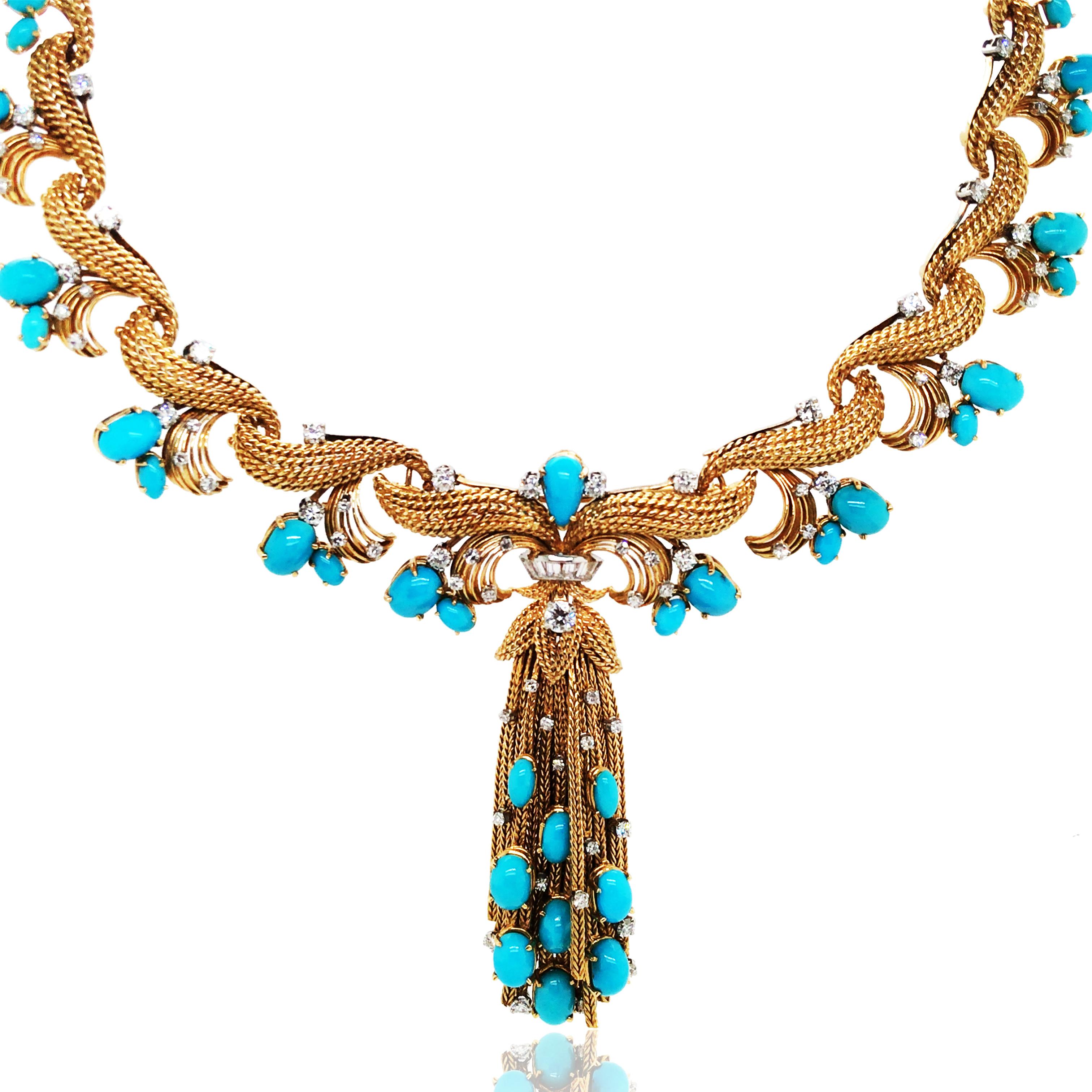 18K gold necklace with a removable center section allowing it to be worn as a brooch, containing 41 round, oval and pear shaped turquoise cabochons, 82 round brilliant and single cut and five baguette cut diamonds total approx. 2.0ct.  

Weight: