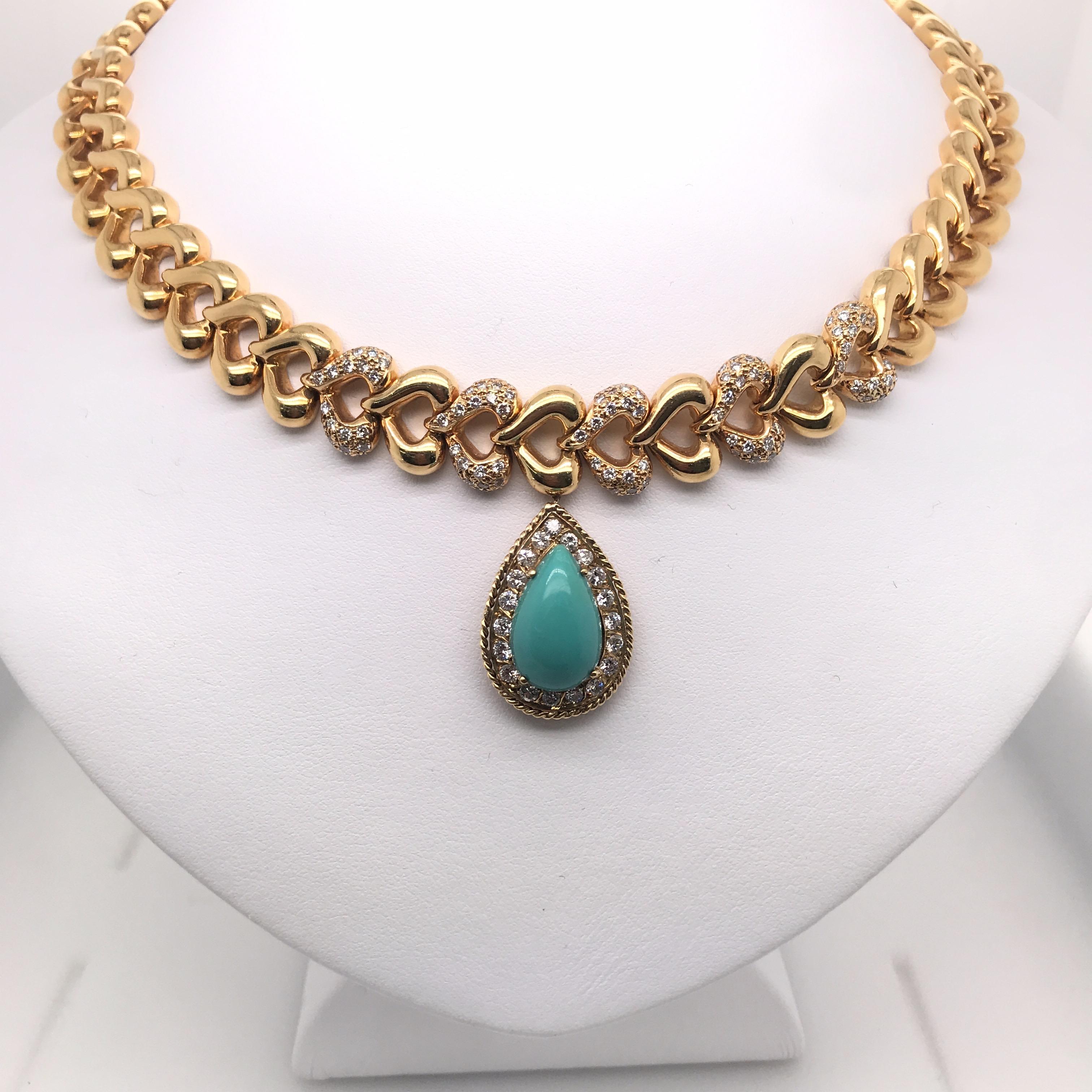 18K Yellow gold necklace featuring one pear shape Turquoise flanked with round brilliants and a heart motif collar. 
5 Diamond Heart Links
Approximately 2 Carats