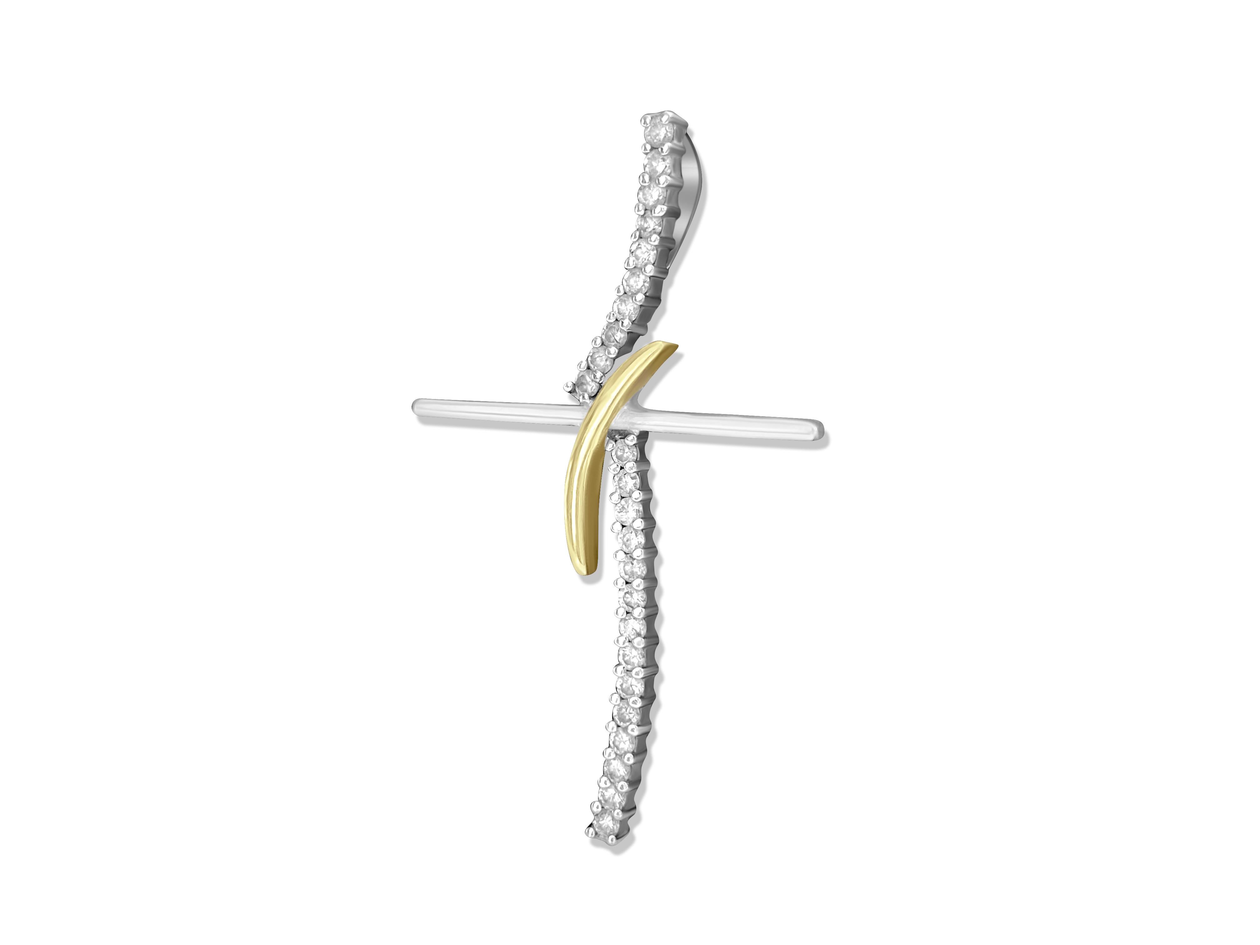 Experience divine elegance with our Two-Tone Diamond Cross, crafted from luxurious 18k white and yellow gold. Adorned with shimmering 0.80 carat diamonds boasting VS clarity and G color, this cross exudes brilliance and sophistication. With its