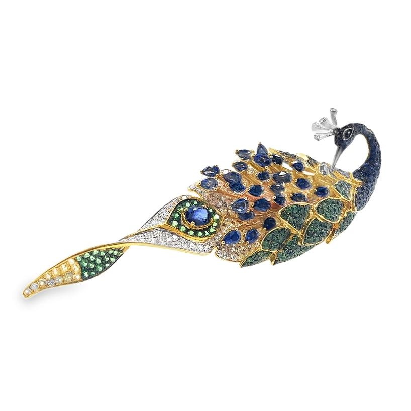 18K Gold Unheated Sapphire & Green Garnet Peacock Brooch & Pendant with Diamonds

1 Unheated Sapphire - 0.477 CT
27 Sapphires - 5.096 CT
216 Diamonds - 2.731 CT
18K Gold - 14.05 GM

Crafted with meticulous artistry, this exquisite jewelry piece