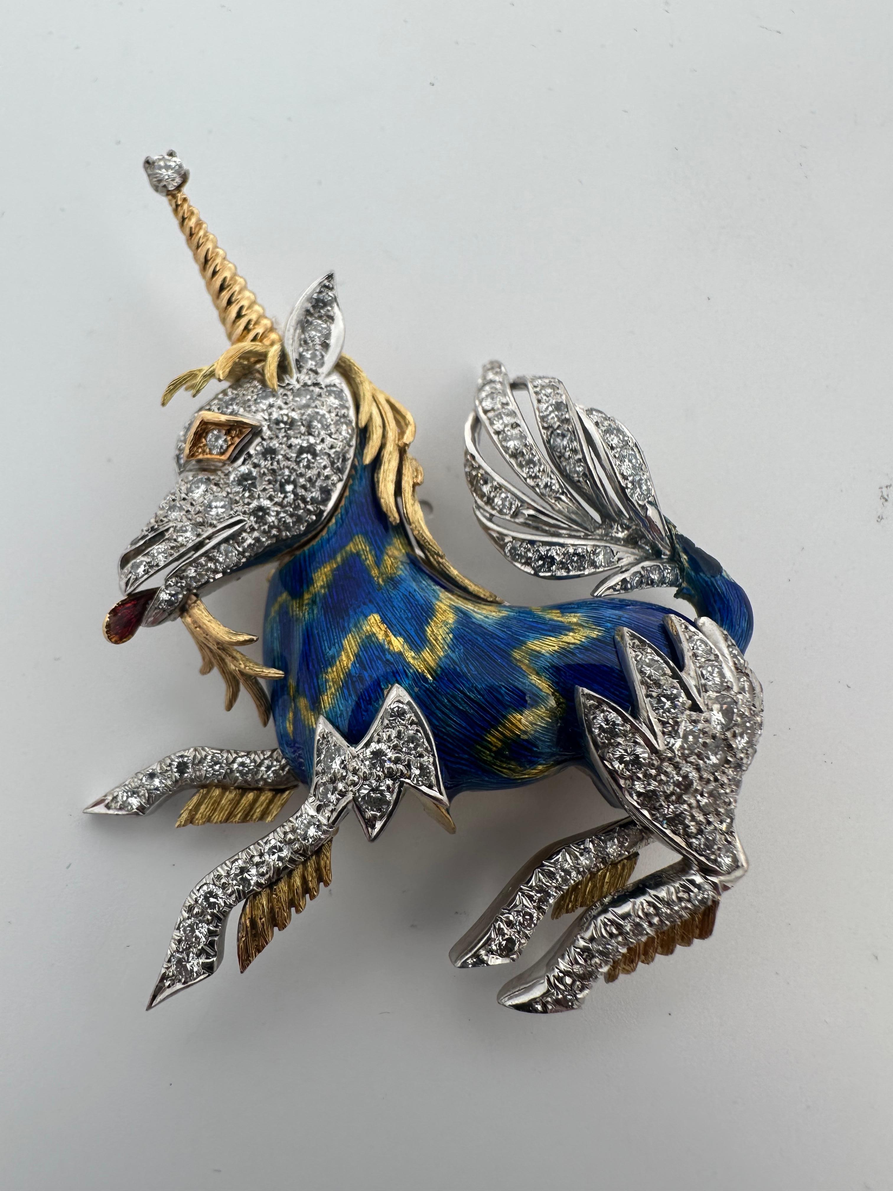 Handmade 18 karat yellow gold diamond and enamel Unicorn Horse brooch. The brooch is pave set with round brilliant diamonds weighing approximately 2.42ct F-G SI-VS clarity. The piece weighs 27.50 grams. 