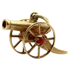 Antique 18K Gold Victorian Articulated Cannon Charm with Coral