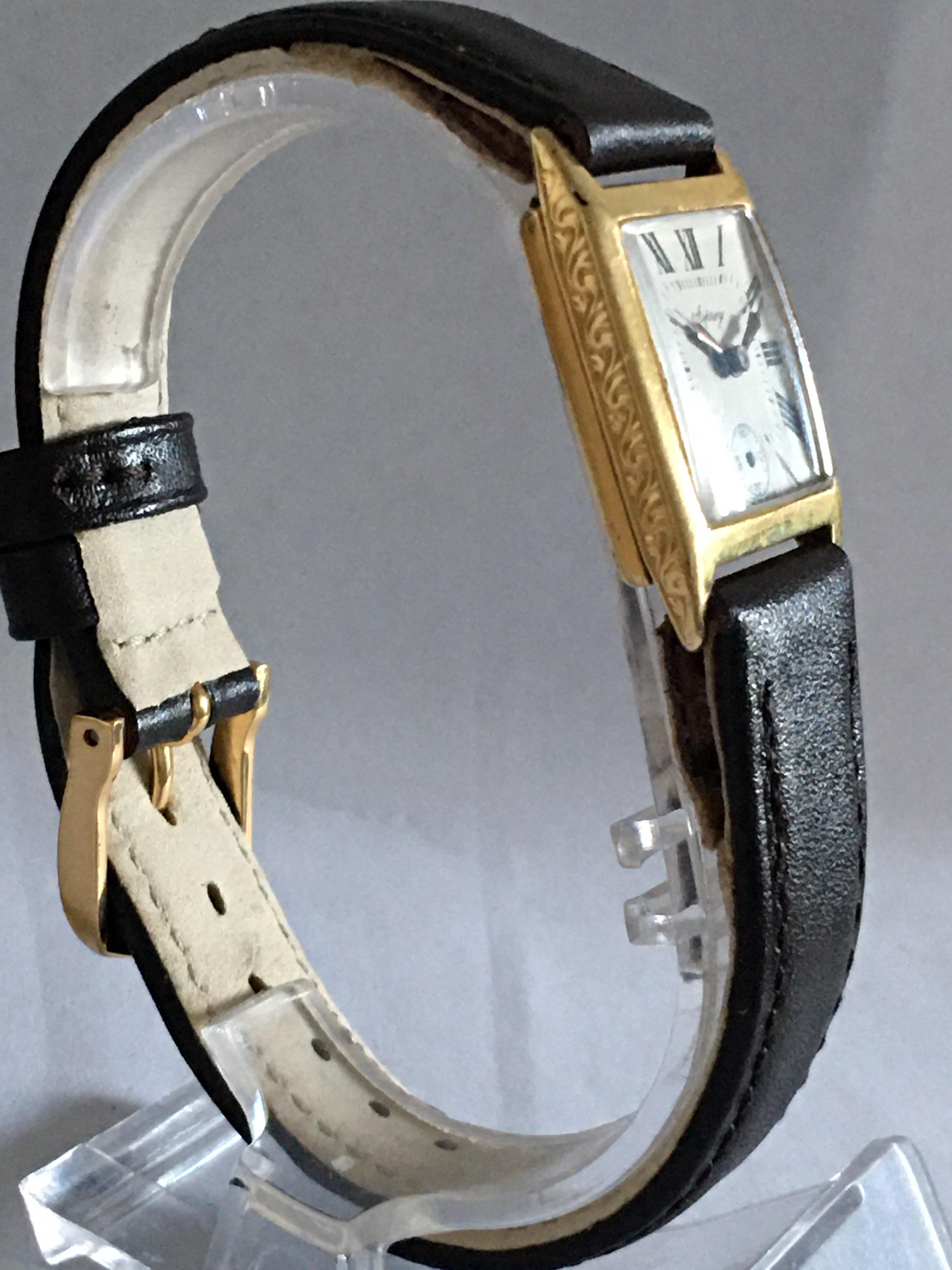 This beautiful 18K Gold mechanical vintage watch is working and ticking well. The Secondary hand is missing. Tiny dent & scratches on the back of watch case as shown. Please study the images carefully as form part of the description.