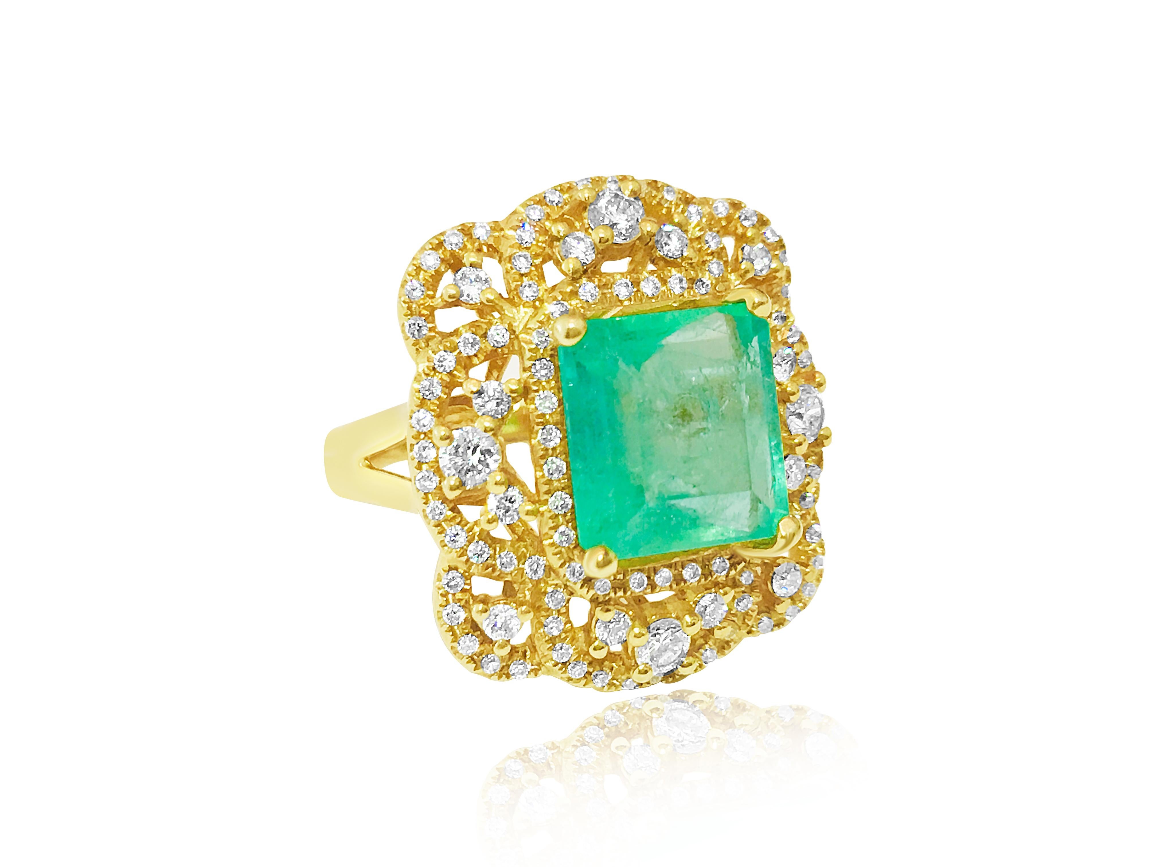 Behold this exquisite 18K yellow gold ring, adorned with a mesmerizing 4.50-carat Colombian emerald, measuring 8.95 x 8.59mm, and showcasing the rich green hue that defines Colombian emeralds. Embracing the emerald are 1.50 carats of diamonds,