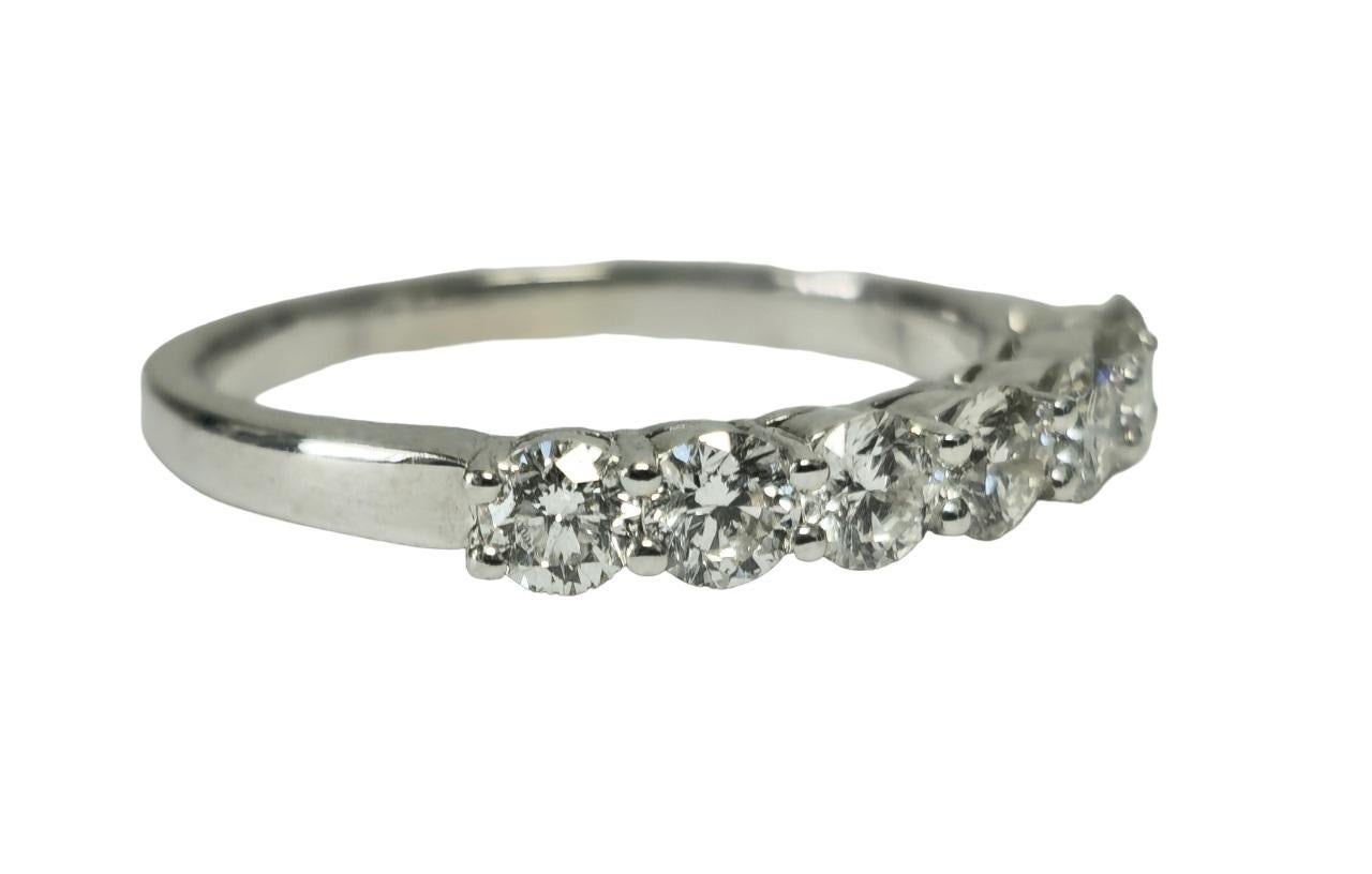 Exquisitely crafted in luminous 18k white gold, this stunning engagement ring features a captivating total weight of 1.00 carat of round brilliant cut diamonds, boasting VVS clarity and F color for unparalleled brilliance. Each diamond is 100%