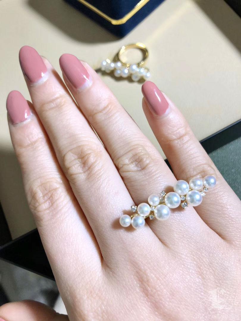 Delicate yet striking, the Aurora Cascade Ring features a flowing composition of high-luster Baby Akoya pearls, ranging from 3.5 to 5.5 mm. Each pearl is meticulously selected for its mirror-like shine and soft iridescence, arranged in a dynamic