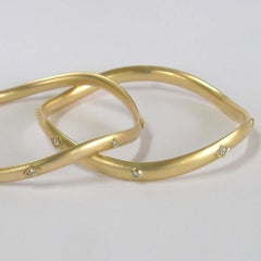 18 Karat Gold Wave Bangle with Diamonds