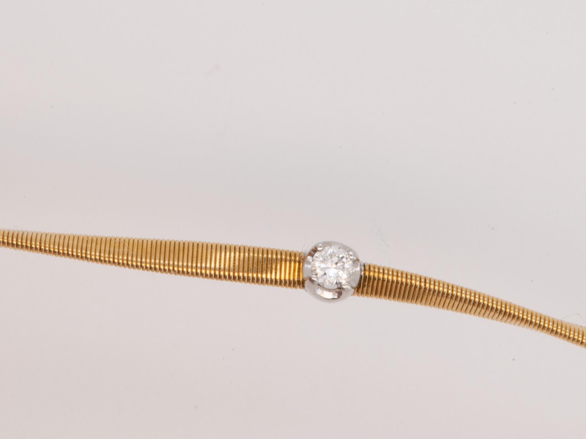 Collana ondulata in oro 18K con stazioni di diamanti da 16,5