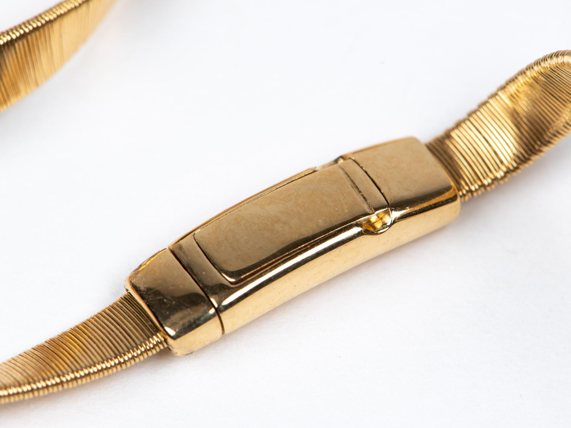 Collana ondulata in oro 18K con stazioni di diamanti da 16,5