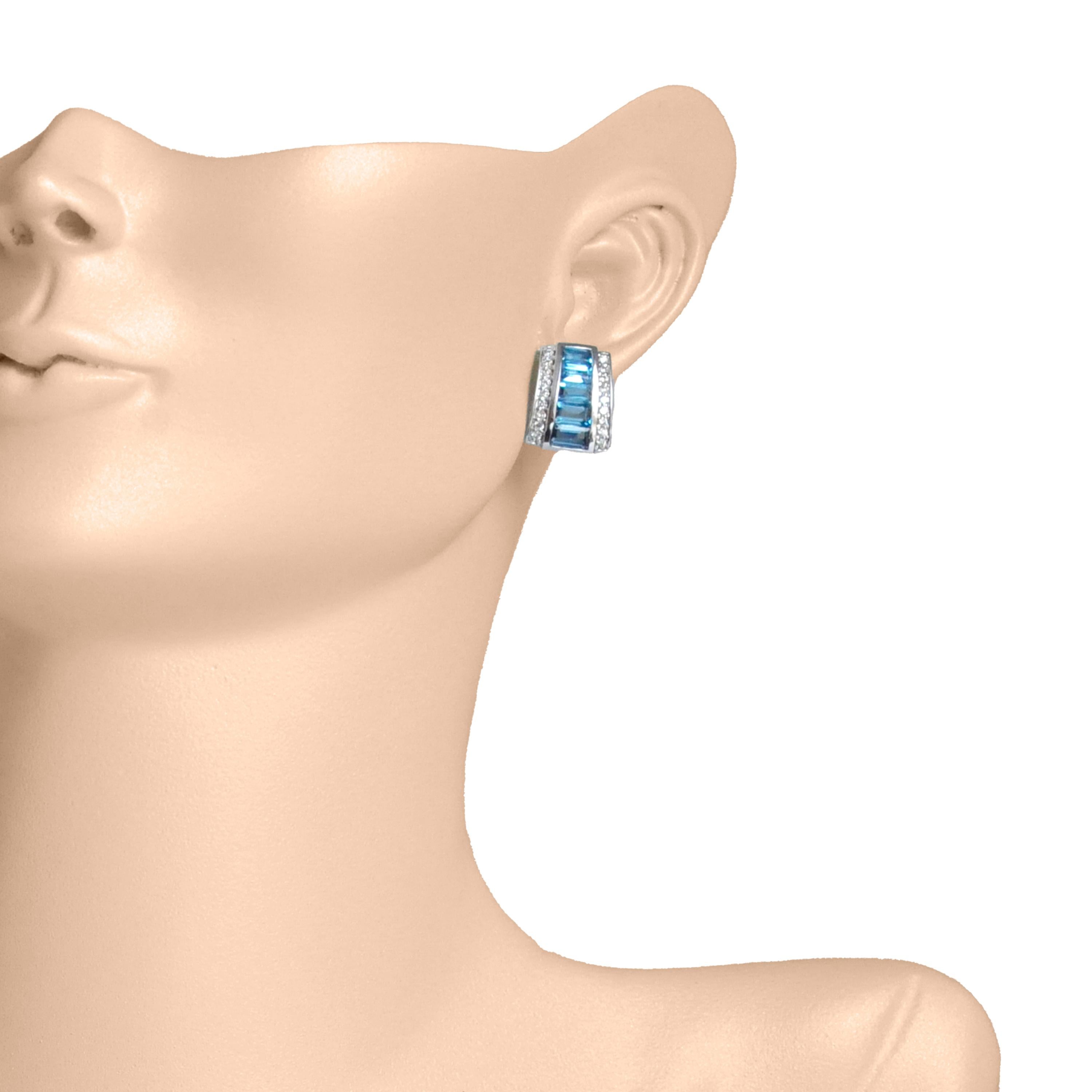Indulge in Art Deco-inspired elegance with our 18k Gold Blue Topaz Pyramid Diamond Stud Earrings. A symphony of color and sophistication, these stud earrings epitomize timeless charm. Brilliant blue topaz gemstones exude a captivating allure,