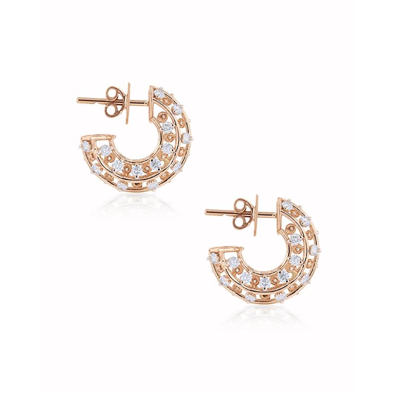 With its open design, the cage earrings embodies both lightness and modernity. Crafted in 18k gold and embelished with floating white diamonds, it is design to shine with you. If you like the design, check out the different sizes.

- 1.1 CT White