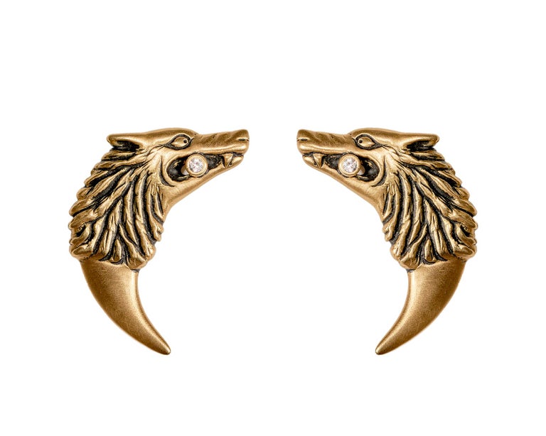 Like many of Wendy's designs, these curved wolf-fang earrings were inspired by a notable woman of history -- in this case, Isabella, the queen consort of Edward II in 14th century England. Edward was a poor ruler, leading Isabella and her lover to