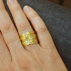 18 Karat Gold Wrapped Wire 'Spaghetti' Ring with Seven 0.03 Carat White Diamonds