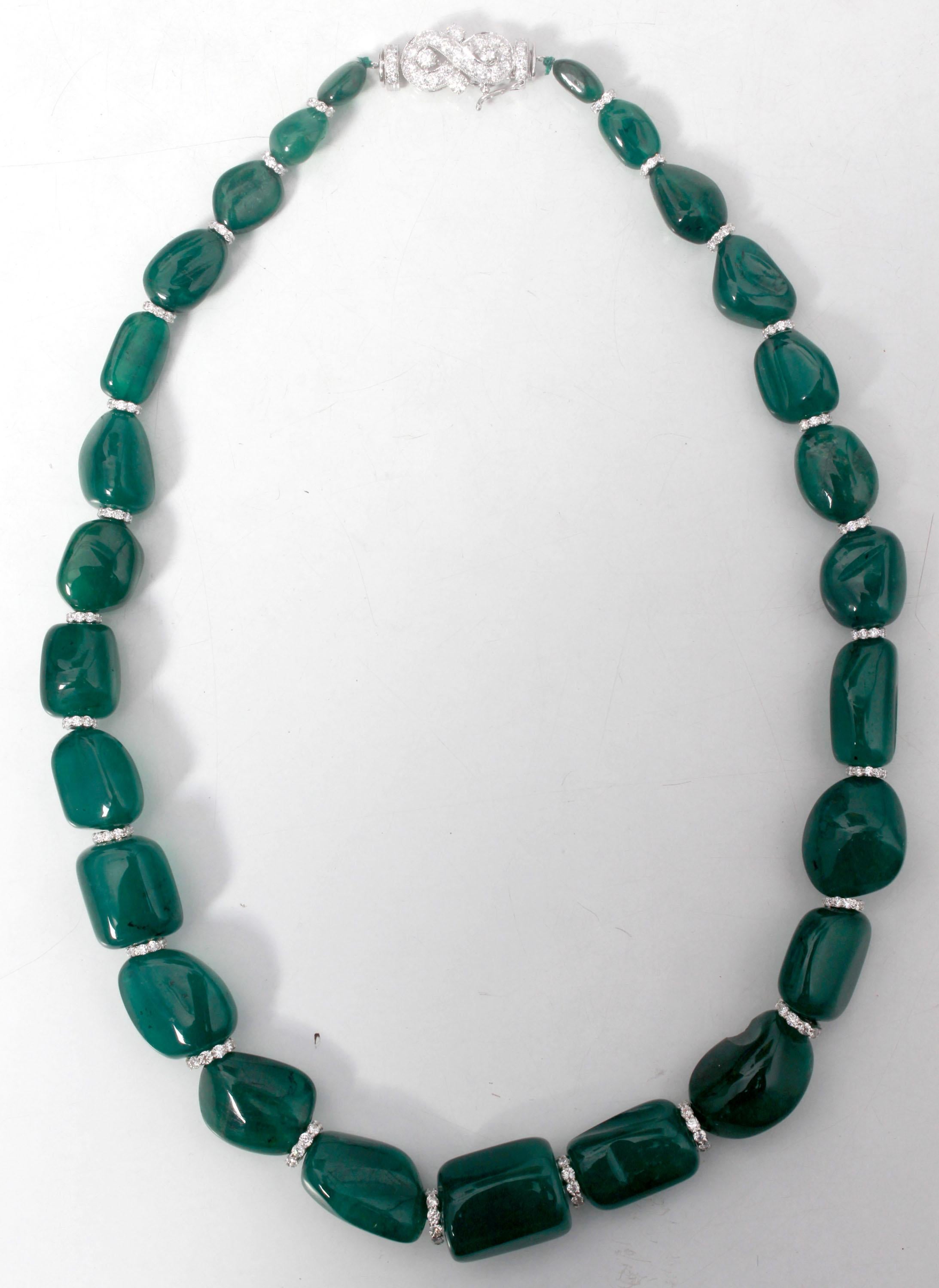 A single strand Zambian Emerald Necklace, which consist of 26 pieces which weigh 658.68 carats and includes 6.87 carats Round White Diamonds.
This necklace is made in 18K White Gold and weighs approximately 18.610 grams.
The clasp is also made of