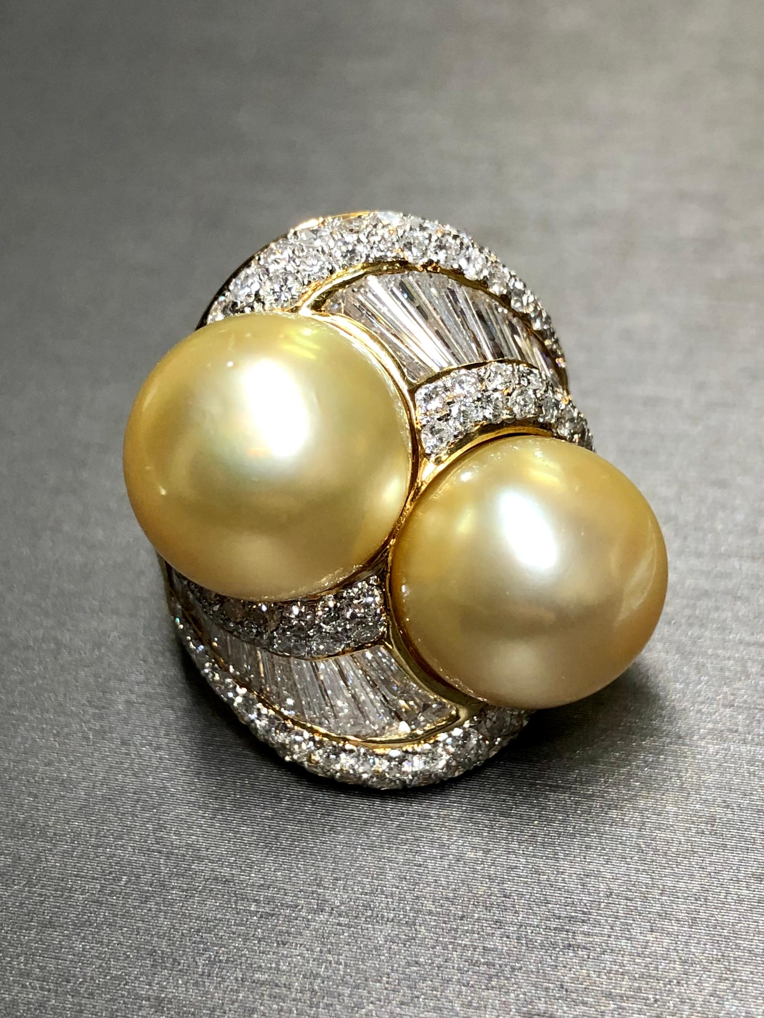 If you have ever wanted a ring with a presence, look no further. This fabulous piece is done in 18K yellow gold and set with approximately 4.50cttw in G-I color Vs1-Si1 clarity round and oversized, tapered baguette diamonds. Sitting next to each