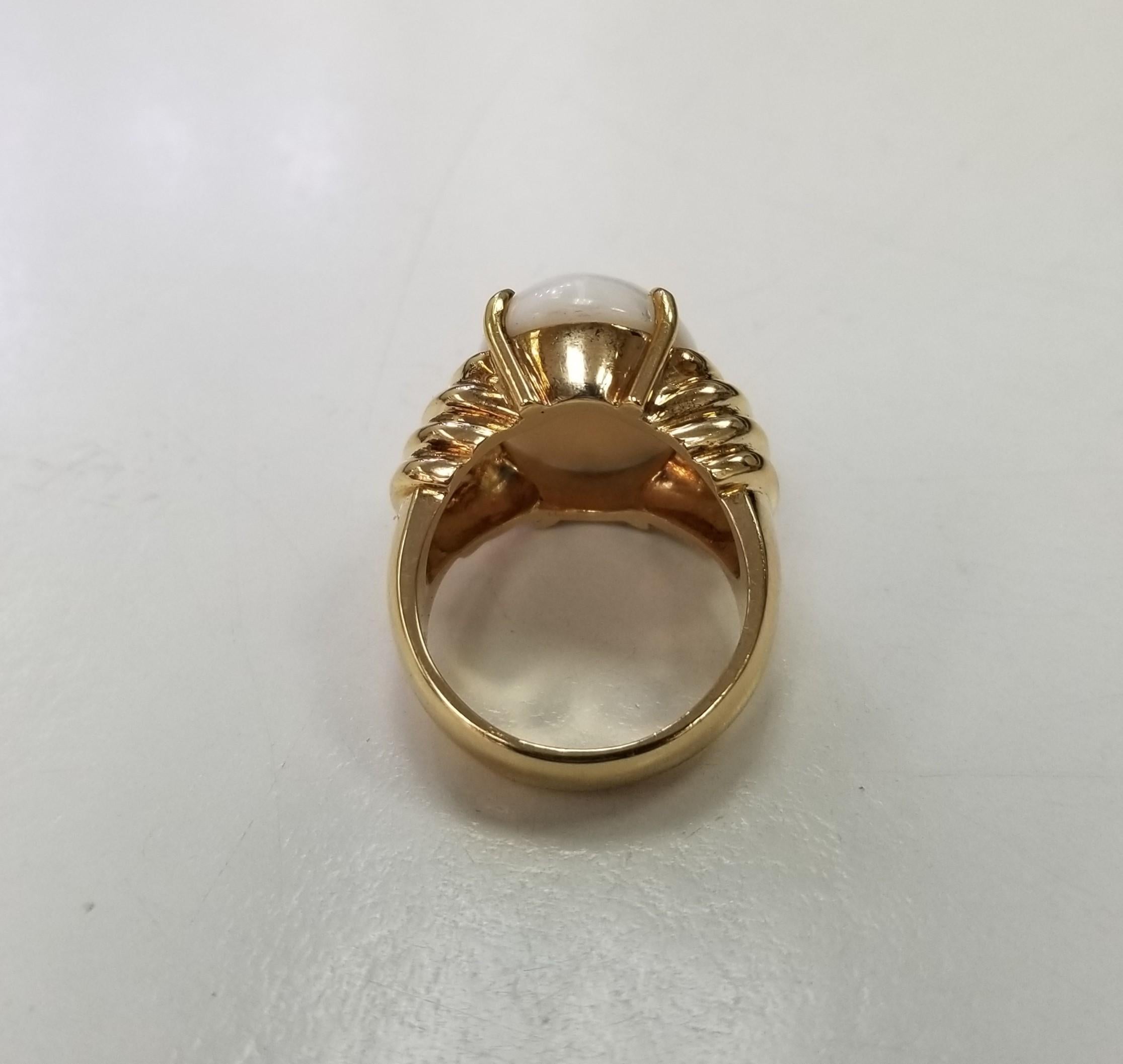 *Motivated to Sell – Please make a Fair Offer*
Gump's 18 Karat Yellow Gold Ring Featuring An 18mm x 13mm Oval Cabochon White Coral. Finger Size 6; One Sizing Service Included With Purchase. Finished Weight Is 13.1 Grams.
metal: 18k yellow