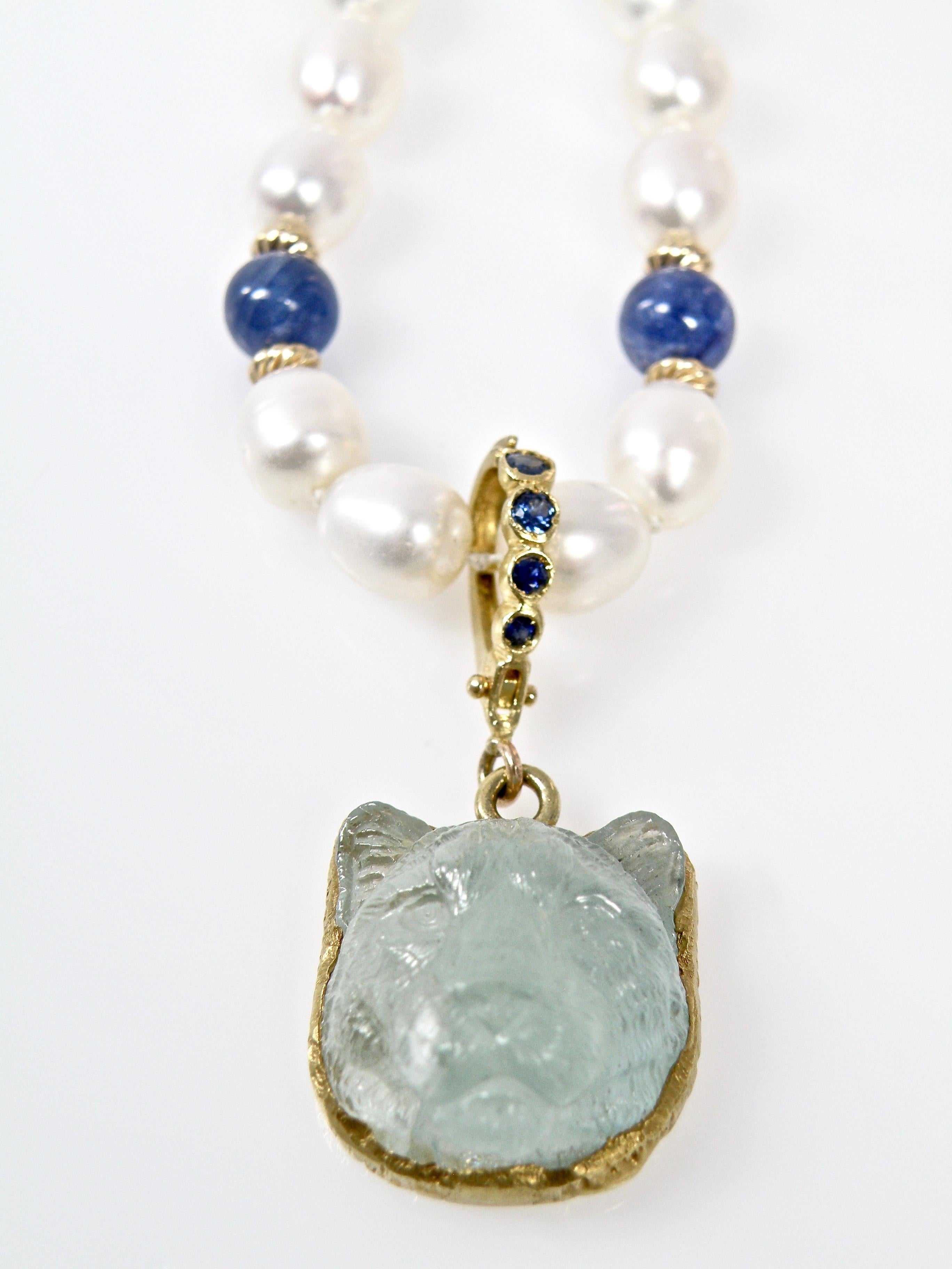 18 Karat Hand Carved Aquamarine Lioness with Sapphire Bail In New Condition In Cohasset, MA
