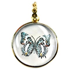 Mariposa Primaveral Pintada a Mano 18K  Cristal inverso  wi Zafiro Fianza