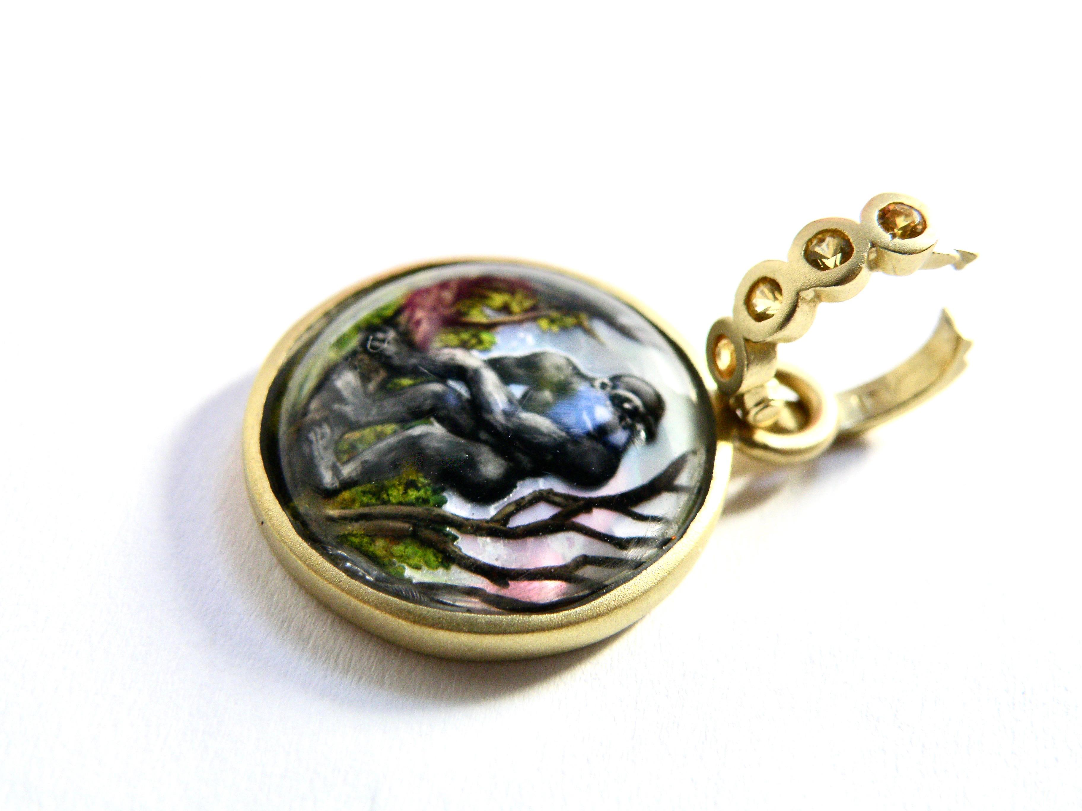 18k hand painted Gorilla reverse crystal gem carving in quarts crystal backed with mother -of -pearl carved by master carver from Idar Oberstein 26mm round with
 .30carat sapphire bail