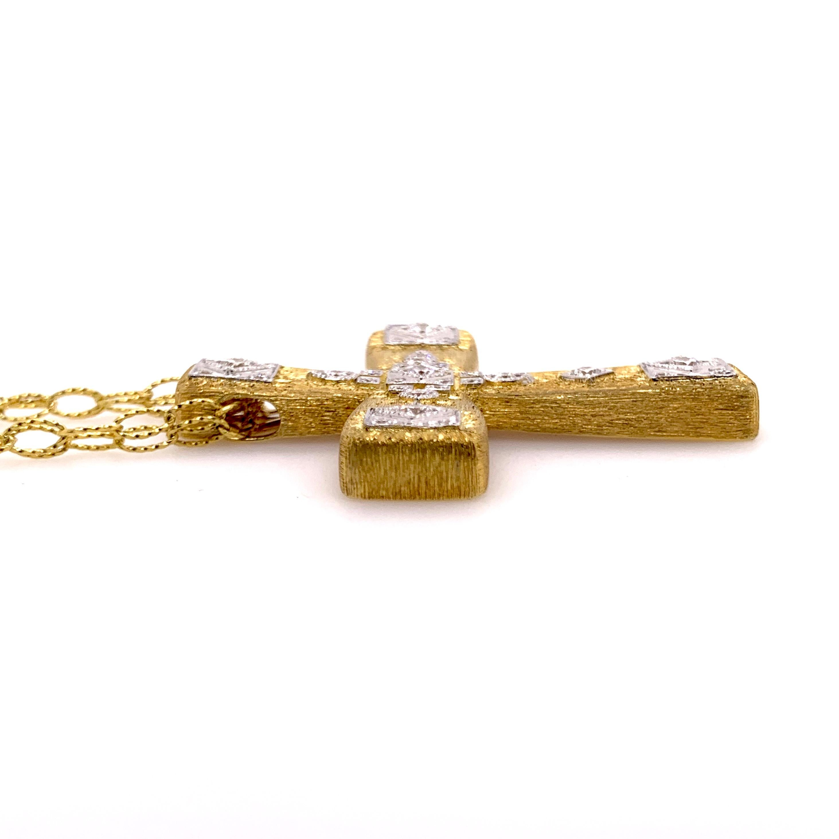 This immaculate handmade diamond cross is absolutely stunning.  The fine details on the gold truly exempts the immense detail and thought process involved in making this heirloom quality piece.  The high shine finish on the backside shows the