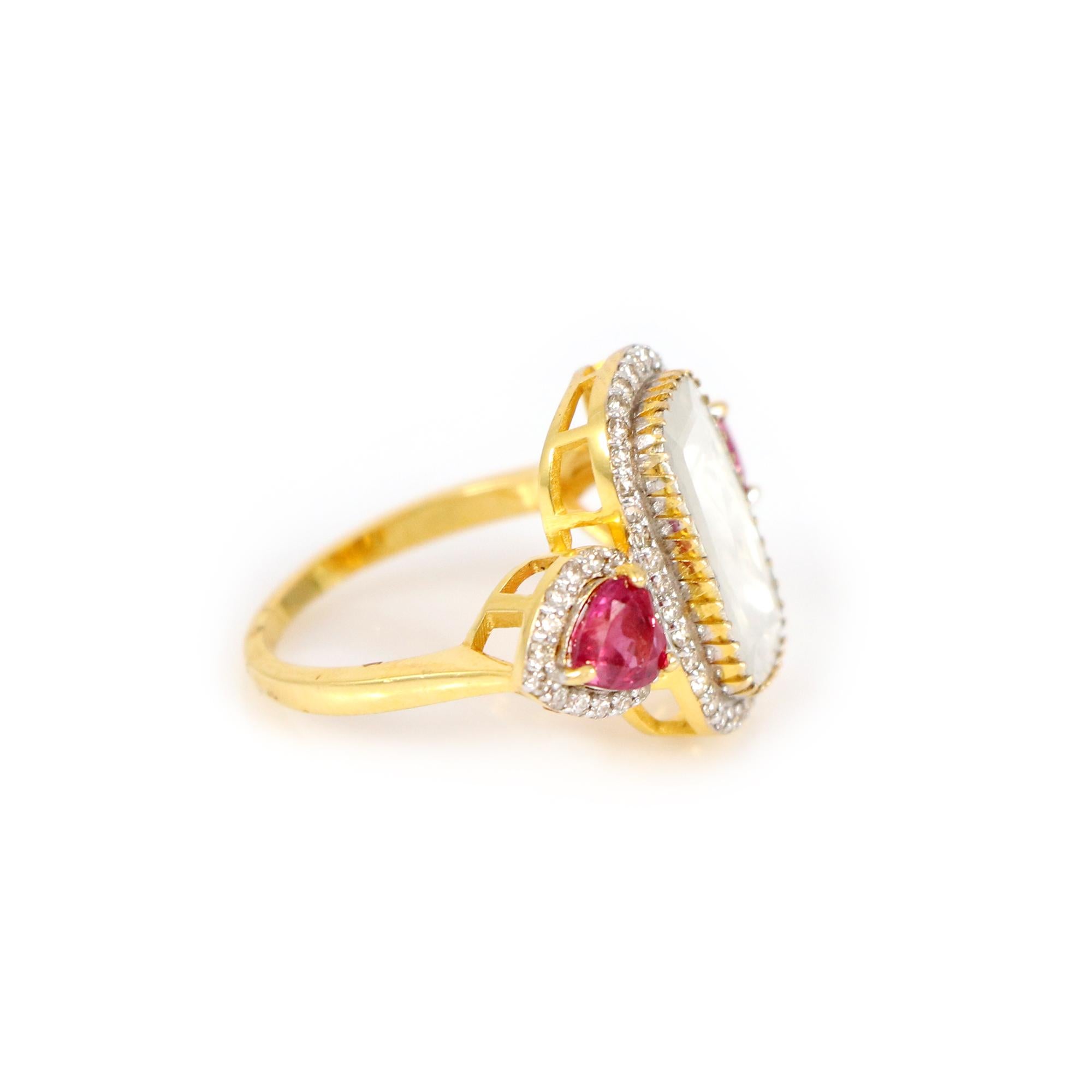 Discover a world of timeless beauty through our classic 18K yellow gold ring, a true masterpiece bedecked with rose cut diamonds, brilliant diamonds, and a heart-shaped ruby. This charming heart-shaped ruby symbolizes love, adding a profound depth