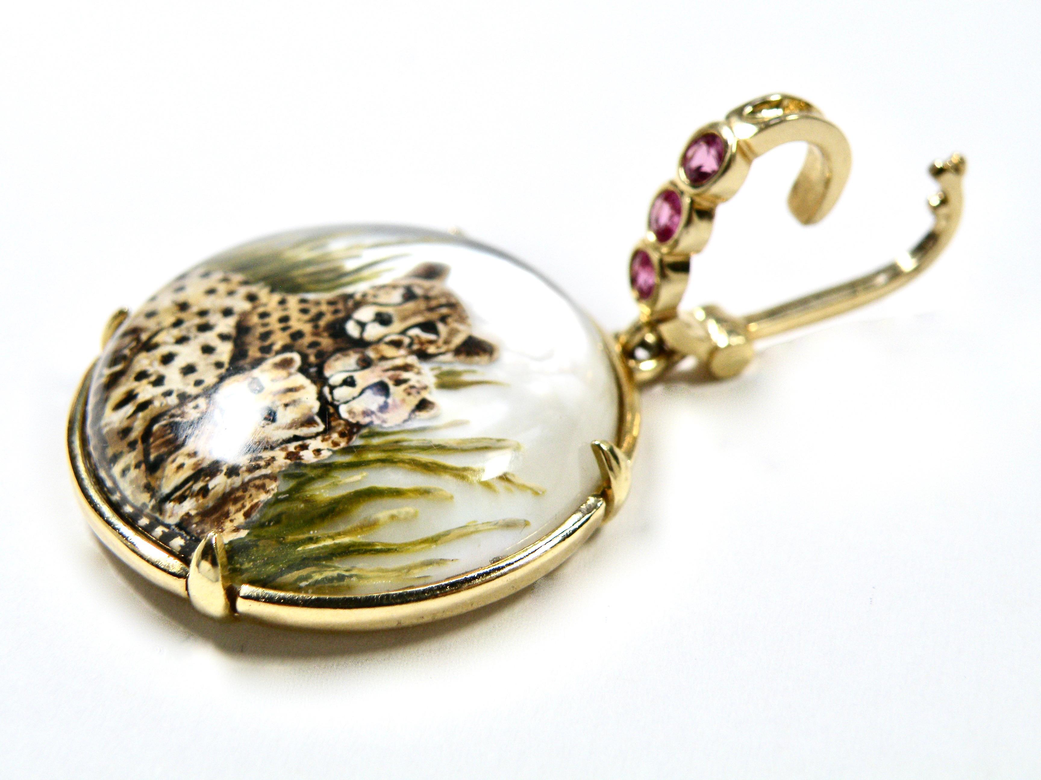 large 18k pendant with sapphire bail. Hand painted Cheetah family, painted on mother of pearl, with reverse crystal.