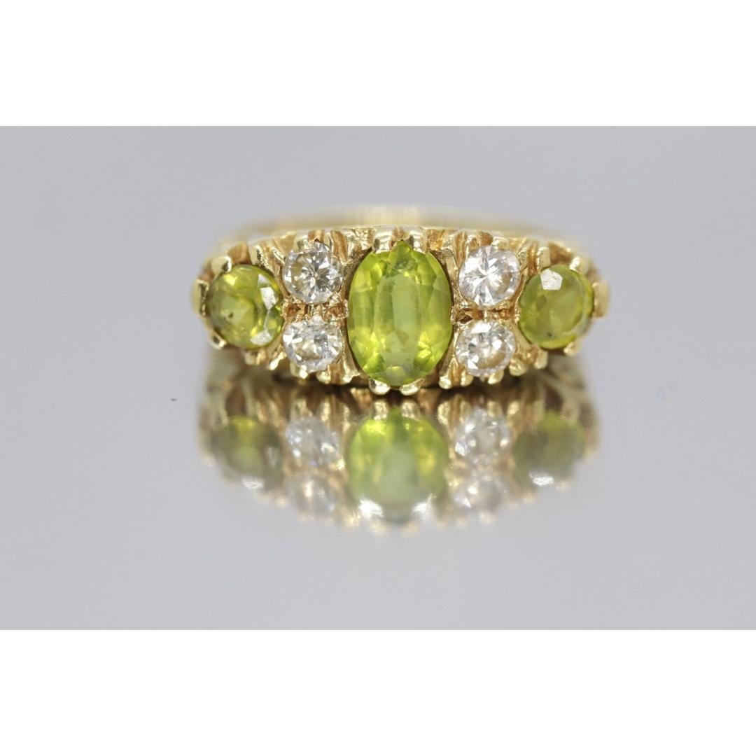18k Large Peridot and Diamond Ring. Made in UK 1976. 6.4grams with 0.40ctw For Sale 1