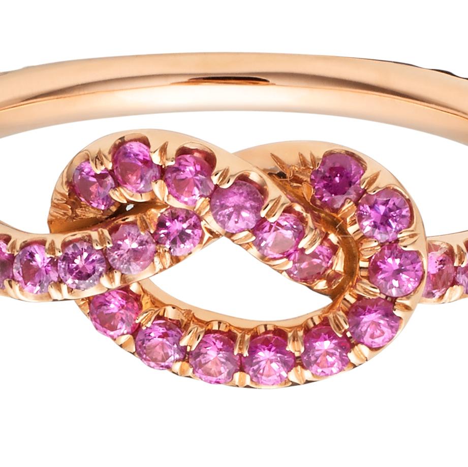 Our large signature Love Knot Ring set with deep pink sapphires. A classic style with a really sweet detail. This 18k Large Pink Sapphire Love Knot Ring is your new favorite ring!

18k rose gold
0.58 carats of pink sapphires.

NB: All of our jewelry