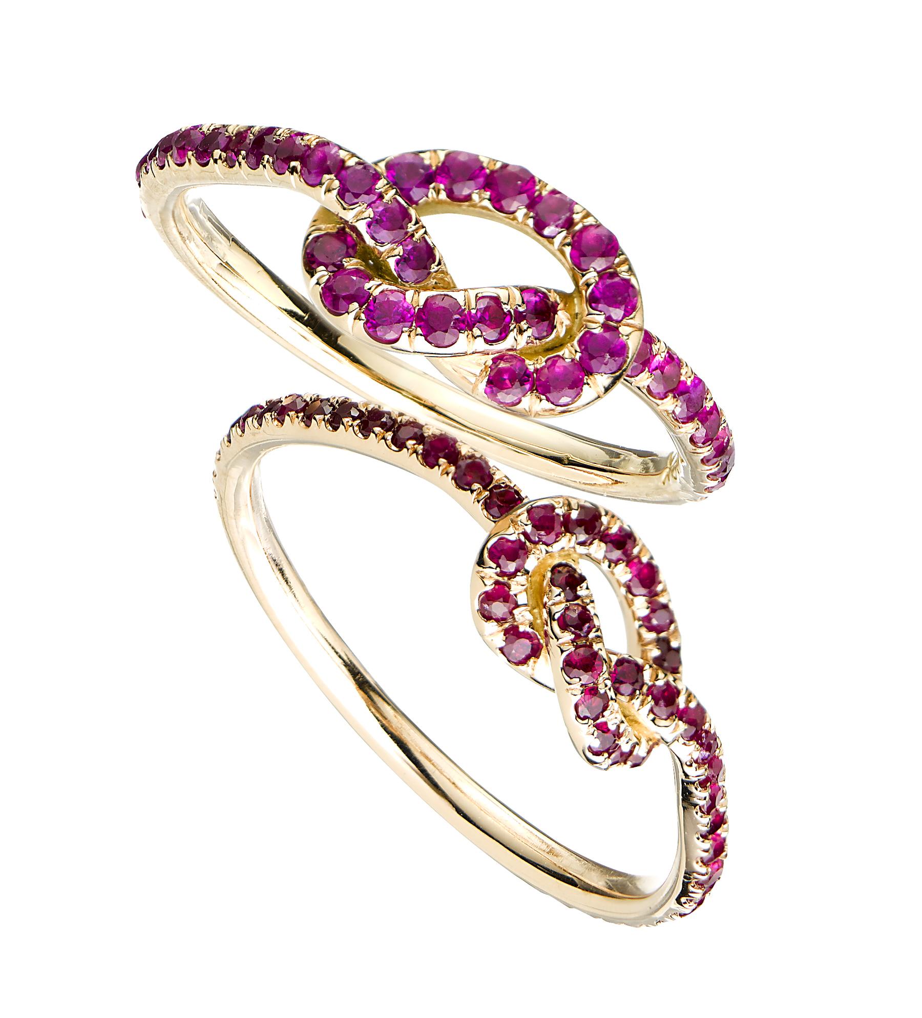 Contemporary 18 Karat Large Pink Sapphire Love Knot Ring For Sale
