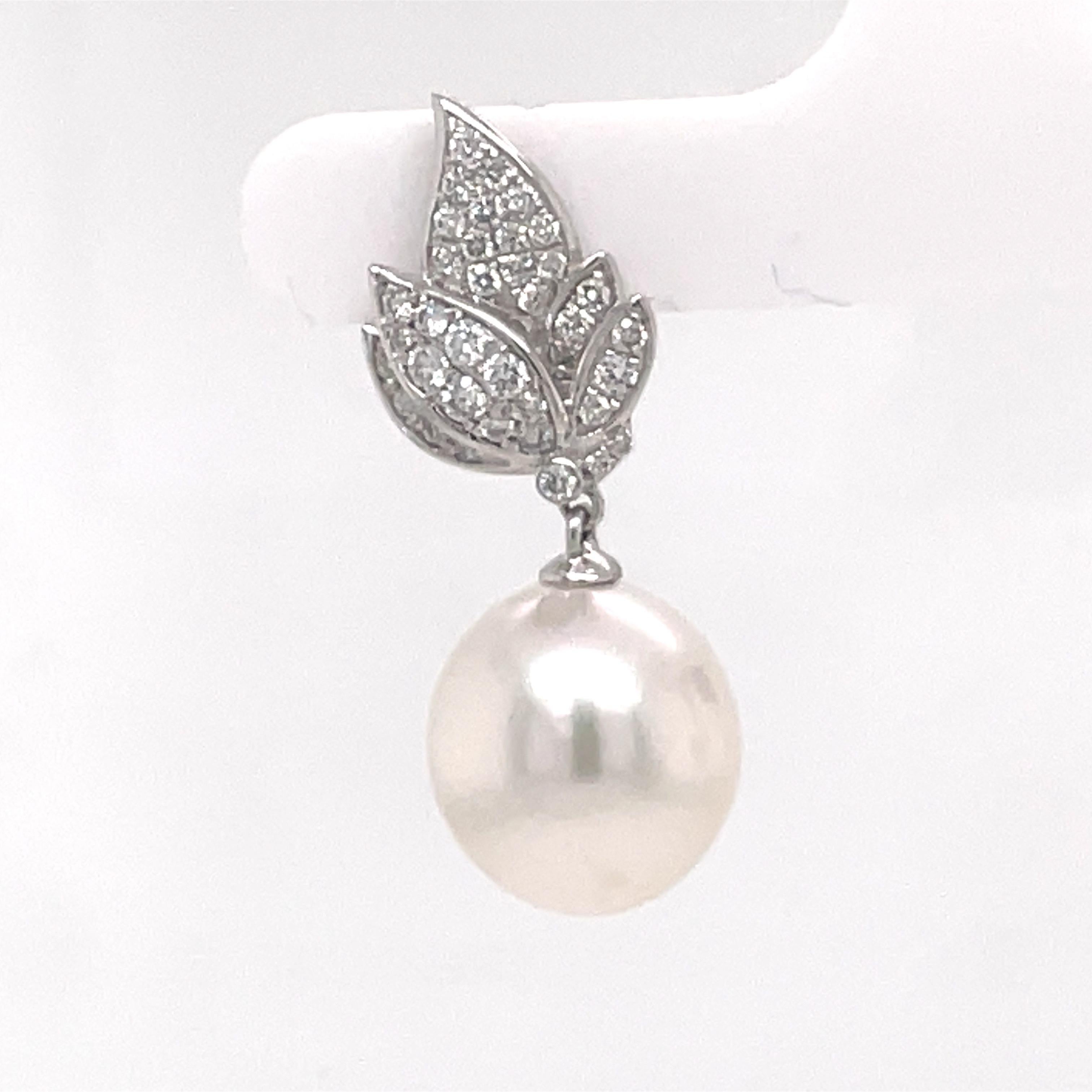Contemporary 18k Leaf Diamond and Pearl Dangle Earrings Dangle For Sale