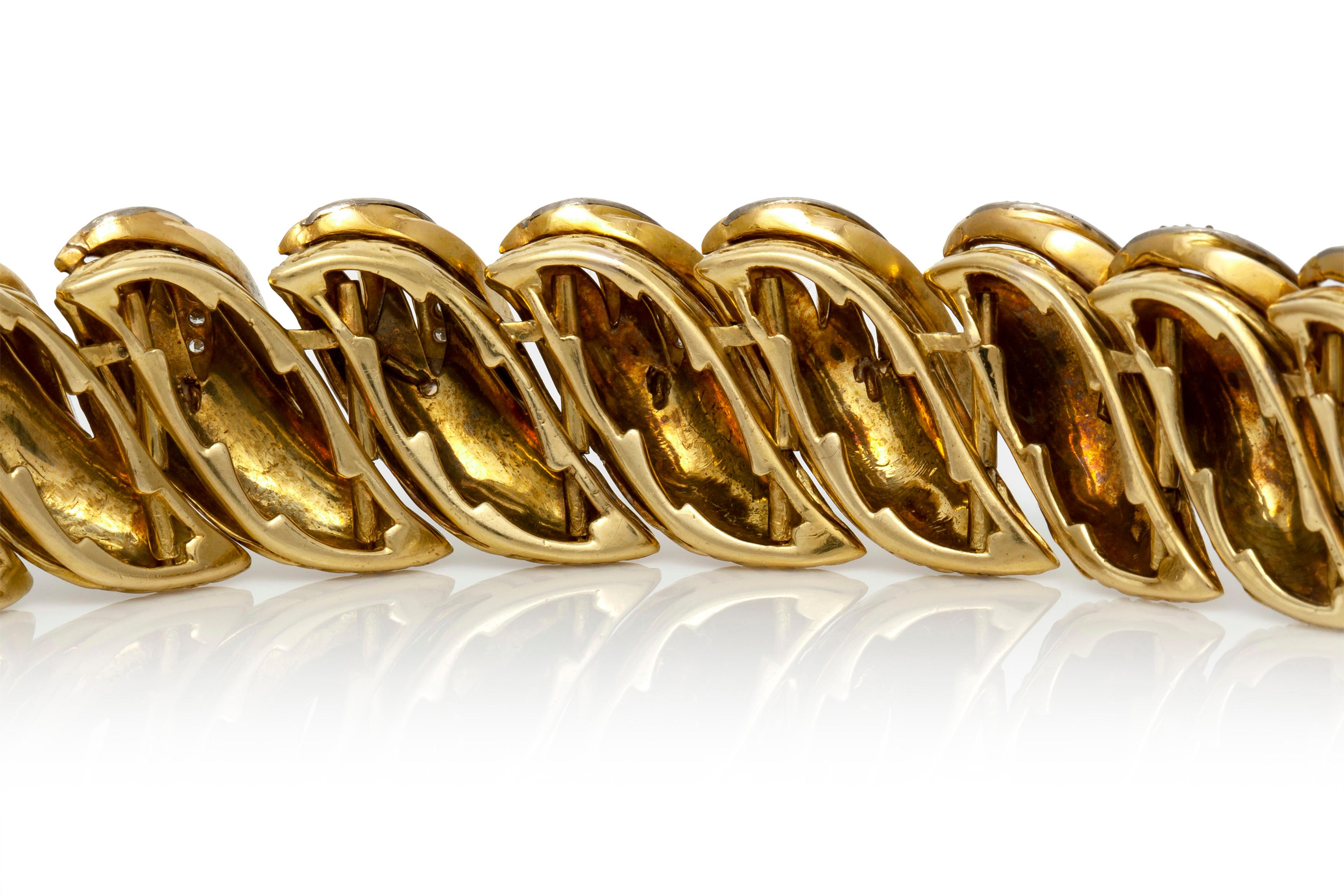 The bracelet is finely crafted in 18k yellow gold with diamonds weighing approximately total of 1.50 carat.
