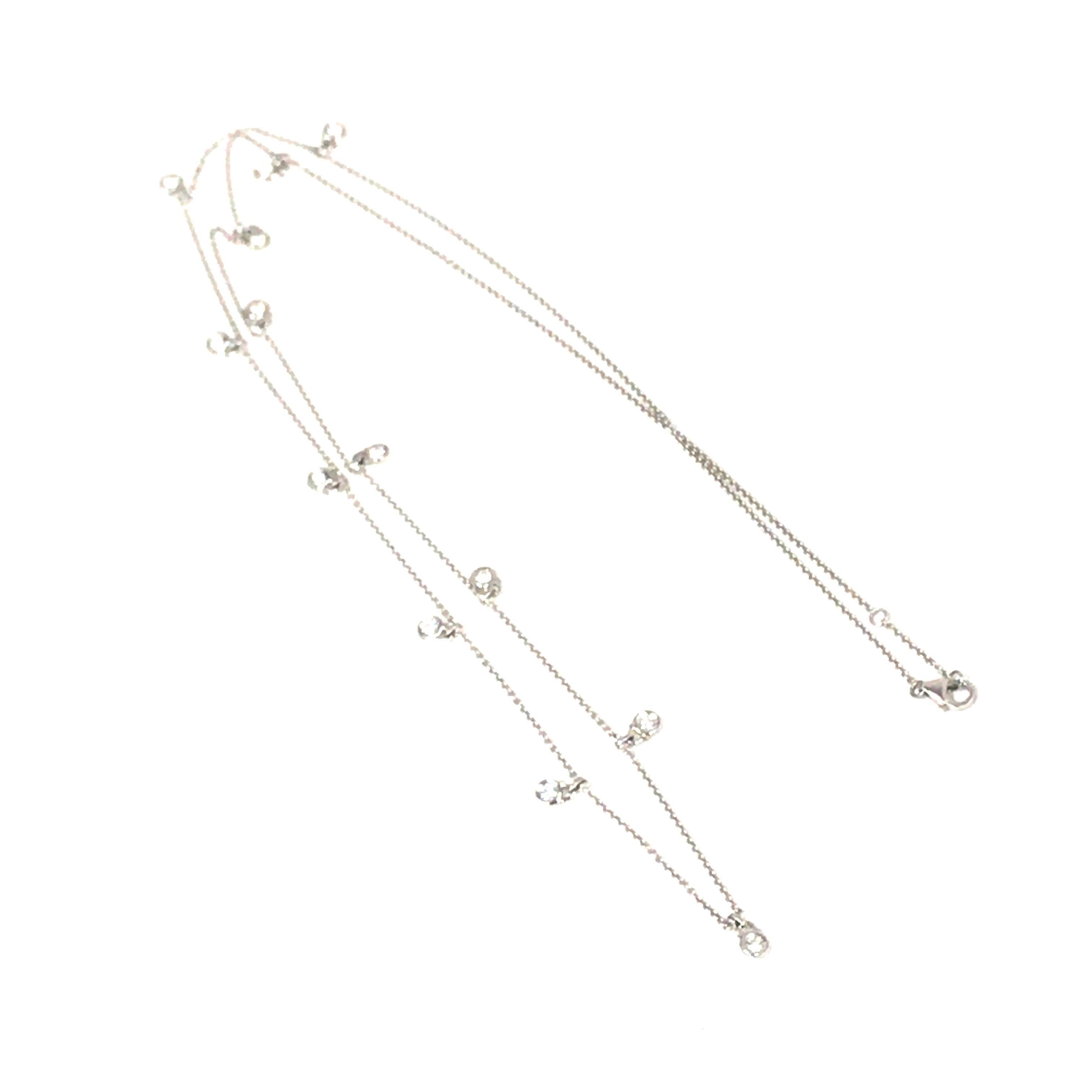 Collar largo de diamantes de 36 pulgadas con colgantes en oro blanco de 18 quilates.  (13) Diamantes redondos de talla brillante con un peso total de 1,37 quilates, color G-H y claridad VS-SI, engastados en bisel en colgantes a lo largo de la