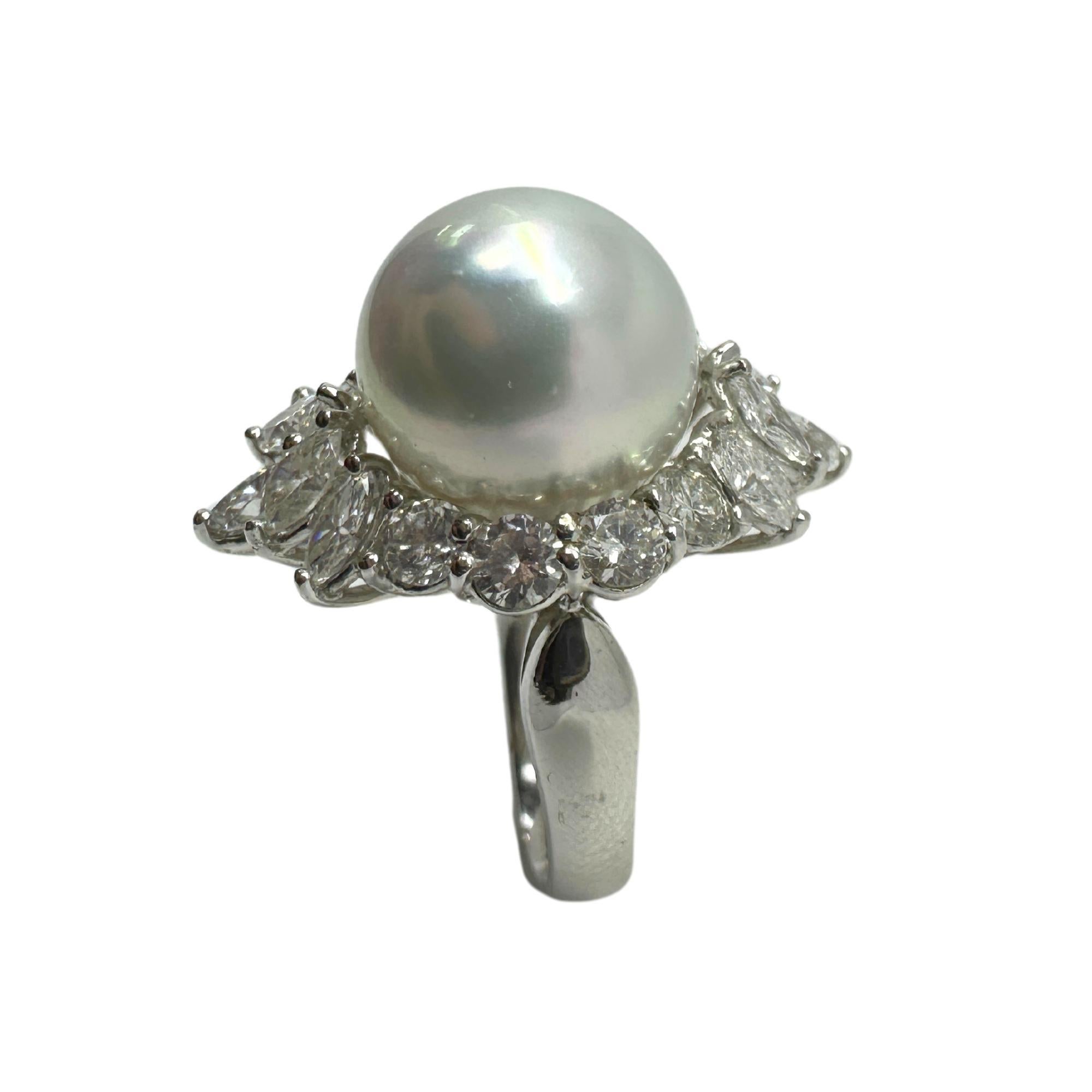 This stunning 18K diamond wide band ring is the perfect addition to any jewelry collection. Made with 18K white gold and 2.34 carats of diamonds, it exudes elegance and luxury. In good condition with minor surface wear, this ring is a size 6.75 and
