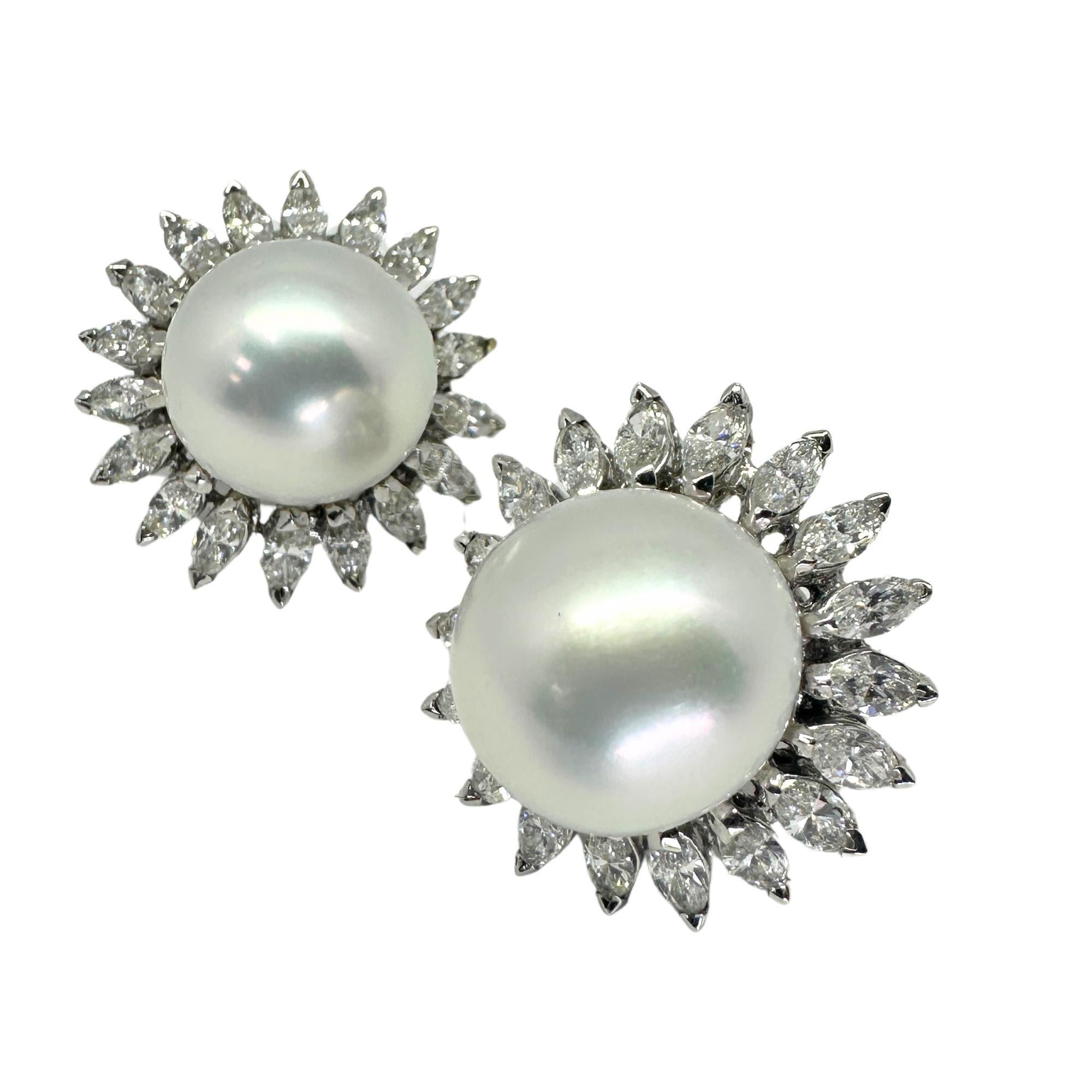 Elevate your style with these stunning 18K Marquise Cut Diamond and Pearl Earrings. Crafted in 18k white gold and featuring 3.69 carats of sparkling marquise cut diamonds, these earrings add a touch of glamour to any outfit. At 0.90 inches in length