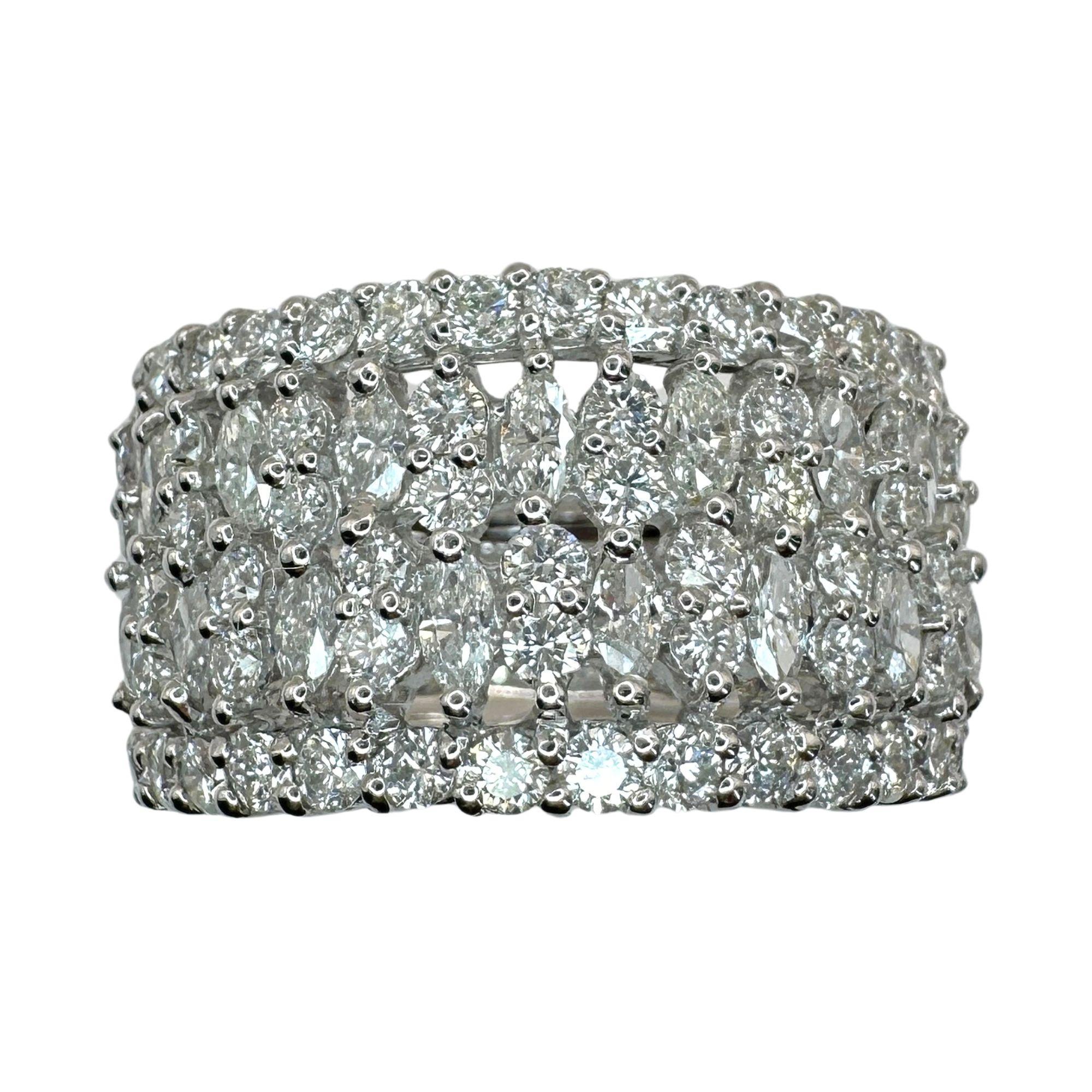 Indulge in luxury with this 18k Marquise Cut Diamond Wide Band Ring. Crafted from 18k White Gold and adorned with 2.37 carats of sparkling diamonds, this ring exudes elegance and sophistication. In excellent condition with a weight of 10.3