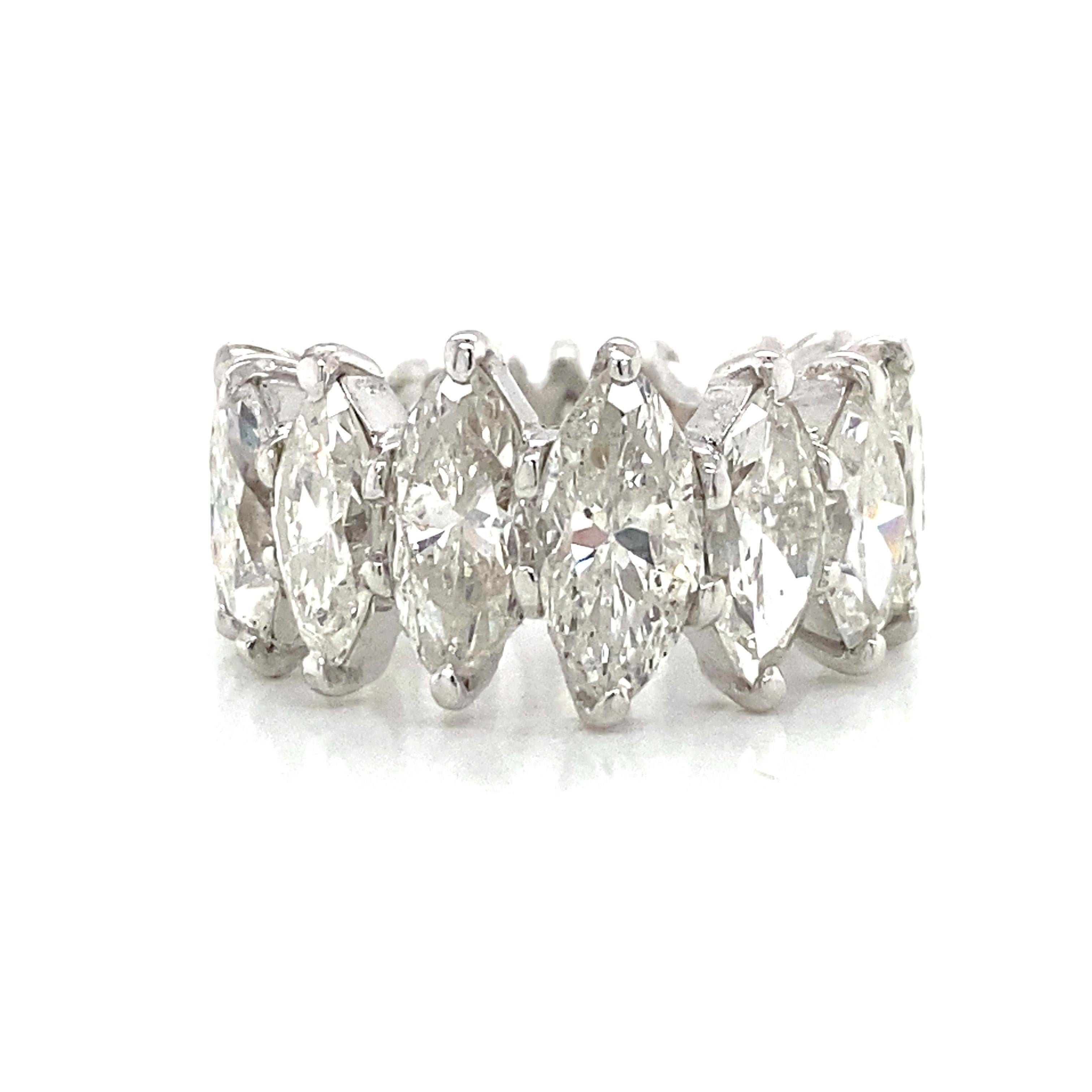 Marquise Diamond Graduated Eternity Band in 18K White Gold.  Marquise Diamonds weighing 7.50 carat total weight, G-I in color and VS-I1 in clarity are expertly set.  The Ring measures 7/16 inch at the widest point.  Ring size 4 3/4. 7.46 grams.