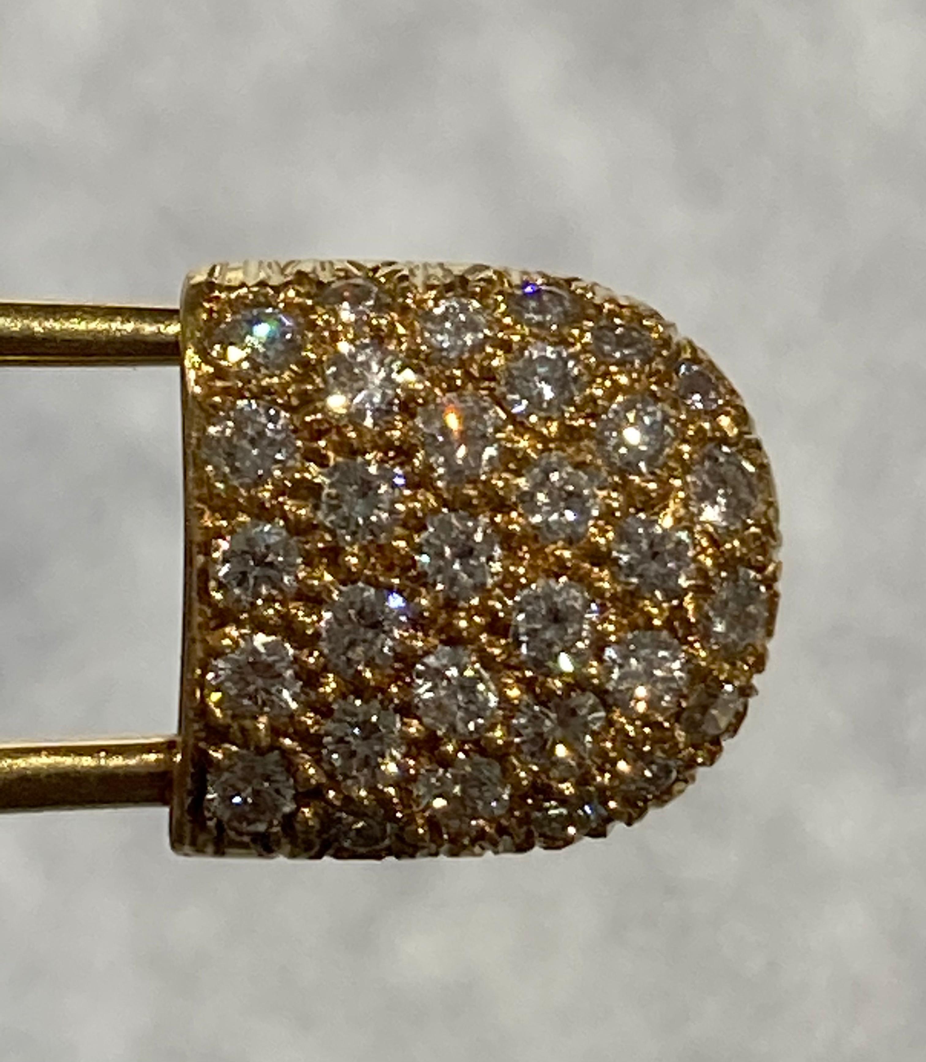 18k McTeigue diamond pin with 0.75cts of F color and VS clarity diamonds.