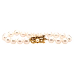 MIKIMOTO Bracelet en or jaune 18 carats et perles avec fermoir à ruban