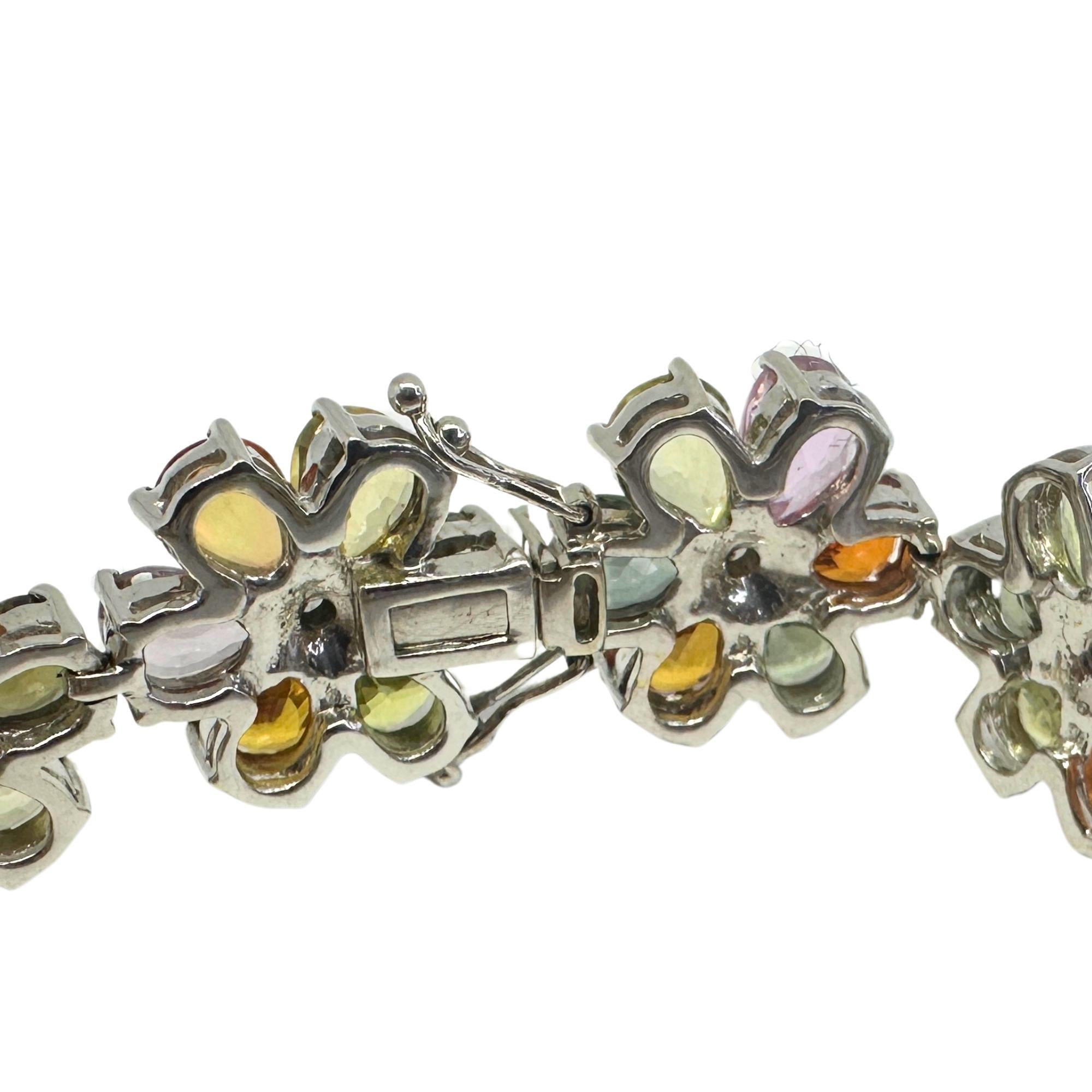 Women's 18k Modern Pear Cut Multicolor Sapphire and Diamond Flower Bracelet For Sale