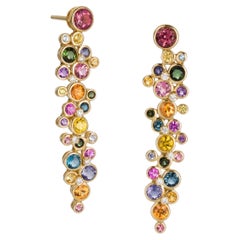 Orecchini allungati multicolore 18k con grappoli di gemme e diamanti