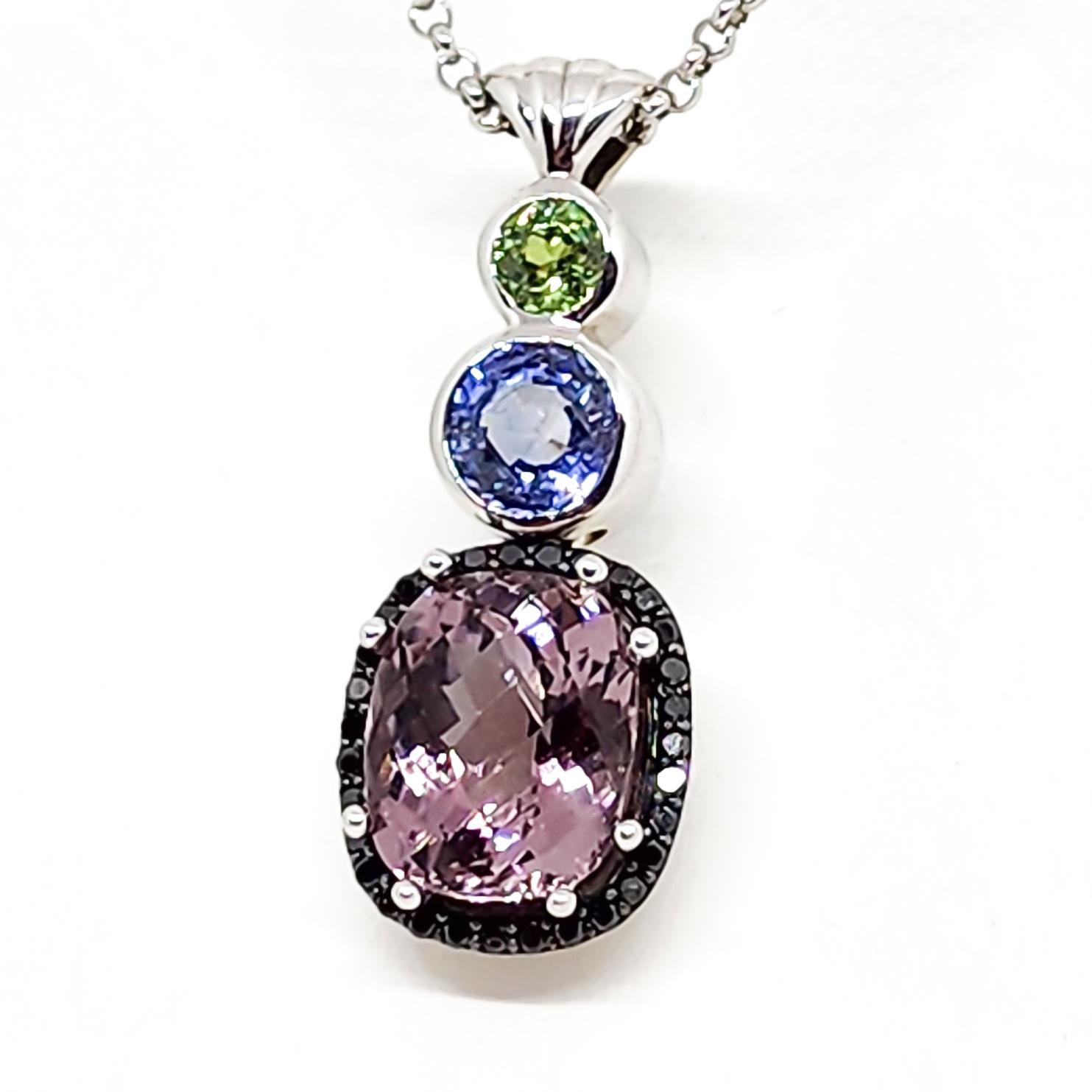 This Custom Designed and Crafted, Drop Pendant Necklace by Artisan Tom Castor features an exceptional Palette of Color with Cool Winter hues and Sparkle. 
The Central focus of the Pendant drop is a Checkerboard Faceted, Cushion Shape, Natural