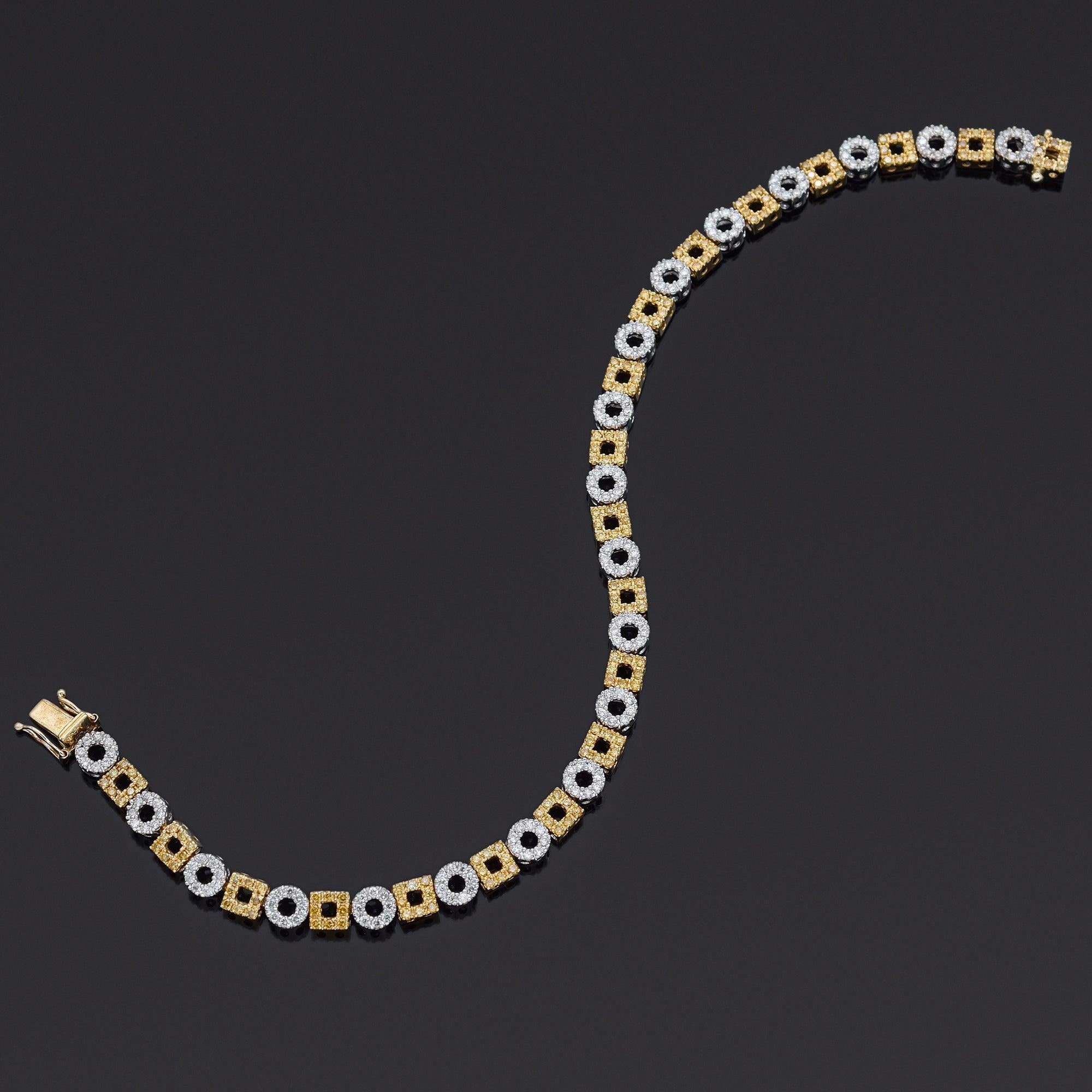 Weight: 13.0 Grams
Stone: Approx 3.20 TCW (0.01 ct) Yellow & White Diamonds
Width: 5 mm
Bracelet Size: 8 Inches
Hallmark: 750

ITEM #: BR-1085-103023-04