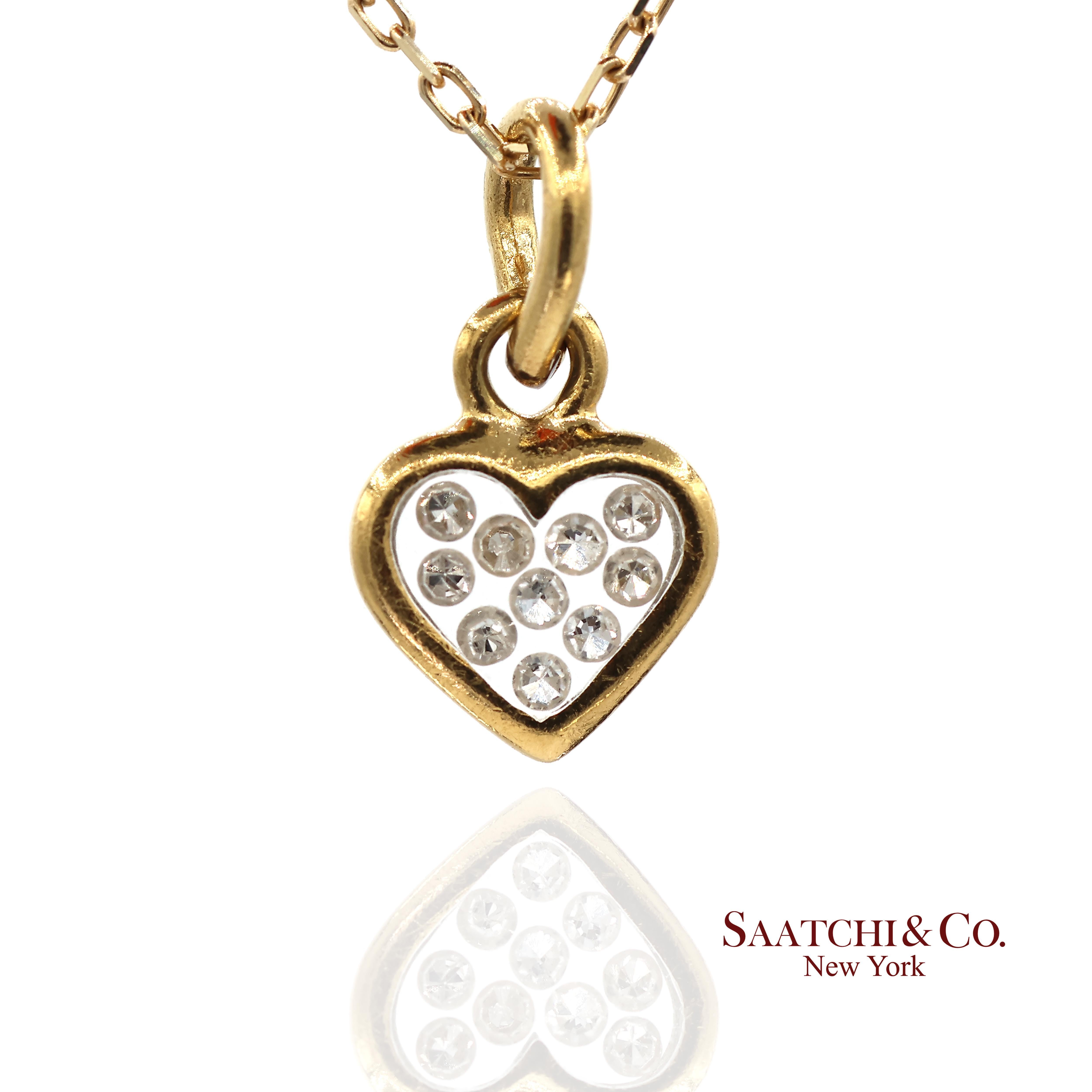 Herzförmiger Naturdiamant-Anhänger mit Gelbgoldkette 

Metall-Typ:  18k Weißgold und 14k Gelbgold
Gesamtgewicht des Artikels: 2,2 Gramm
Länge: 18,0 Zoll
Breite: 7,7 mm
Höhe: 1.5 mm
1:
Primärer Stein: Natürlicher Diamant
Karatgewicht des Diamanten: