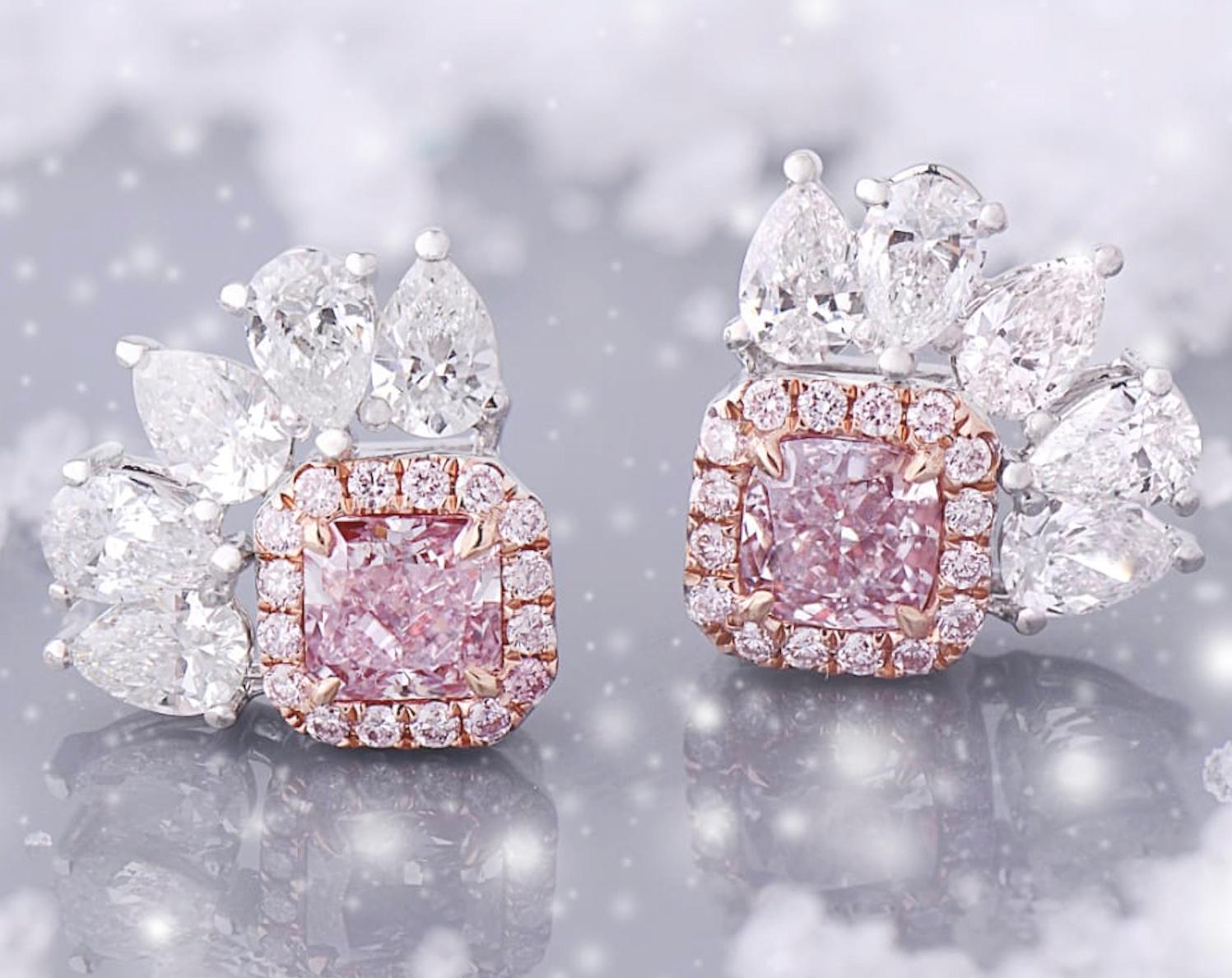 18k Earrings with GIA 0.33 carat Fancy Purplish Pink and GIA 0.30 carat Fancy Purplish Pink,  and 32 round fancy pinks weighing 0.12 carats and 10 pear shape D-E color VVS-VS diamonds weighing 0.82 carats.