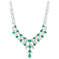 Collier 18K avec émeraudes et diamants